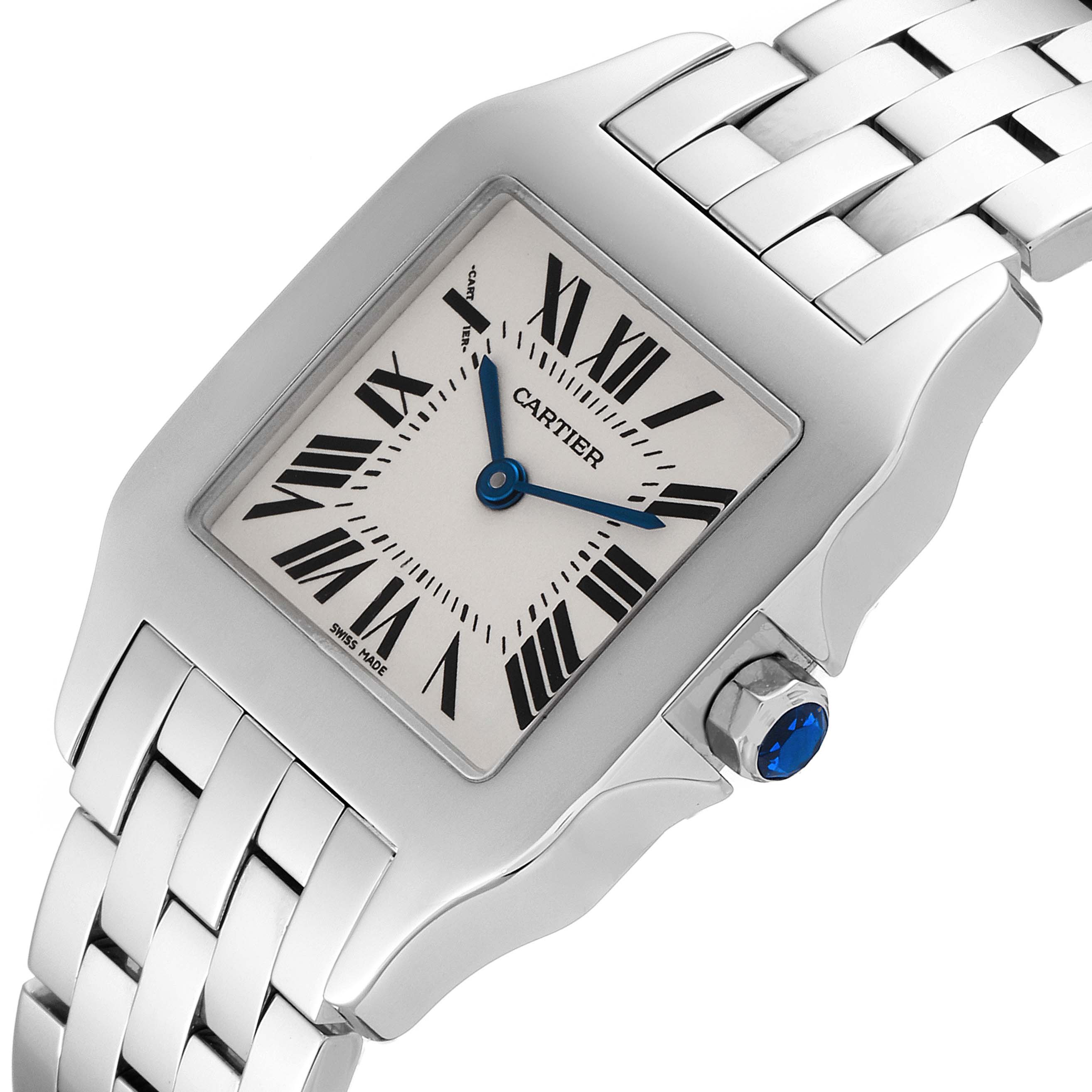 The image shows a Cartier Santos Demoiselle W25065Z5 Women
s Stainless Steel Silver Dial W25065Z5 Women
s Stainless Steel Silver Dial watch at an angle that displays the face, bracelet, and crown with a blue gem.