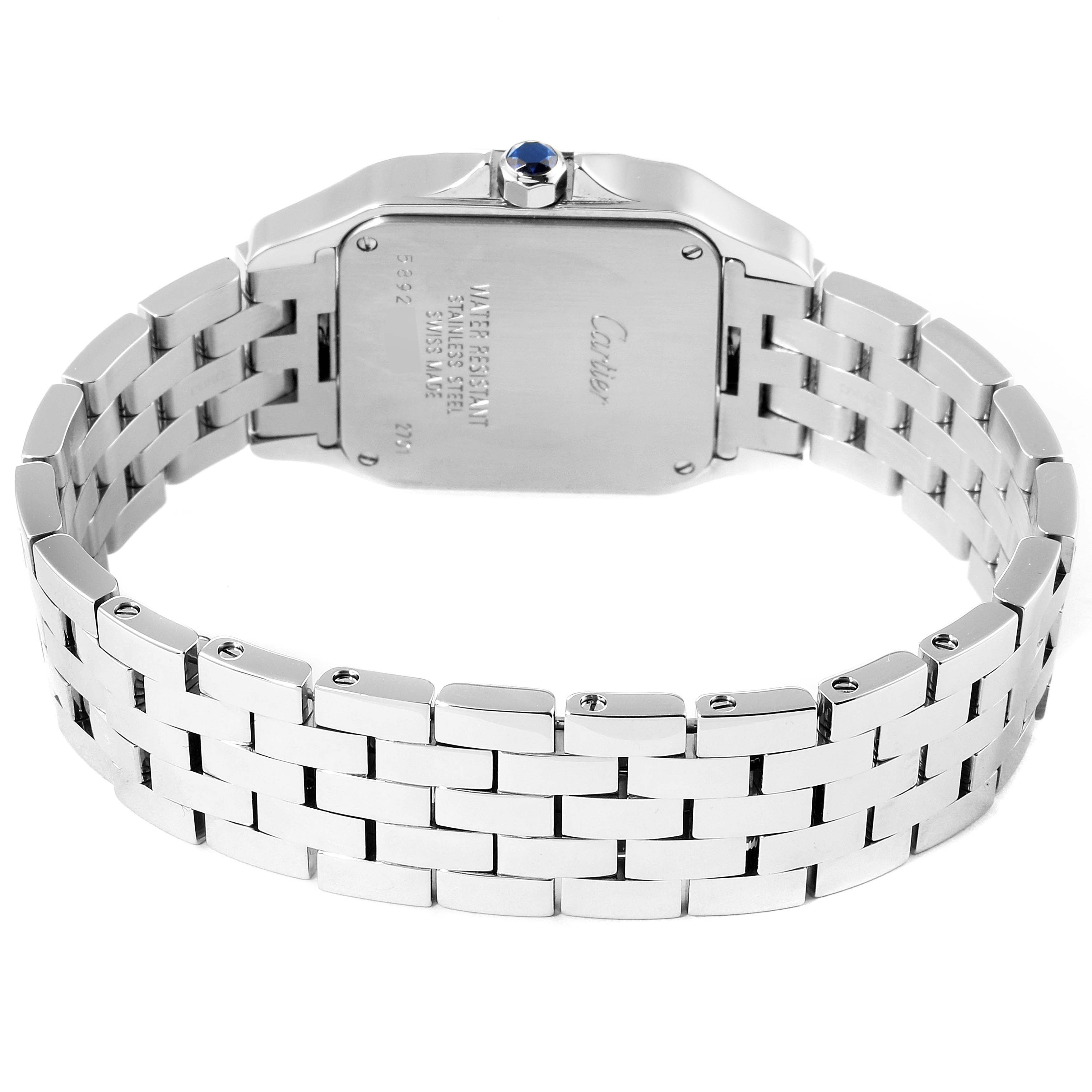 The image shows a rear view of the Santos Demoiselle model by Cartier, highlighting the back case and metal bracelet.
