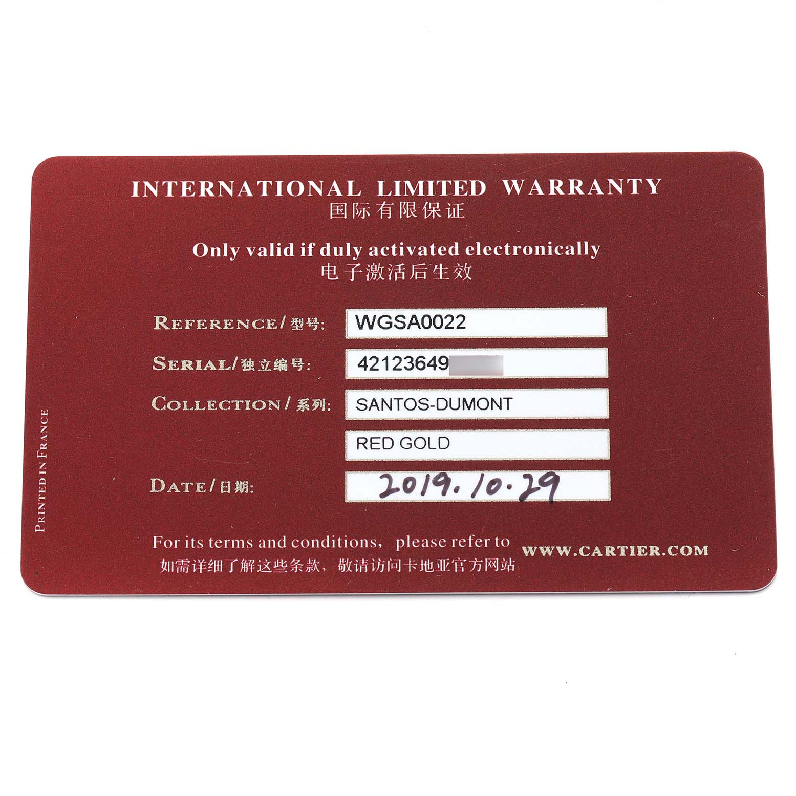 The image shows an international limited warranty card for the Santos-Dumont model by Cartier.