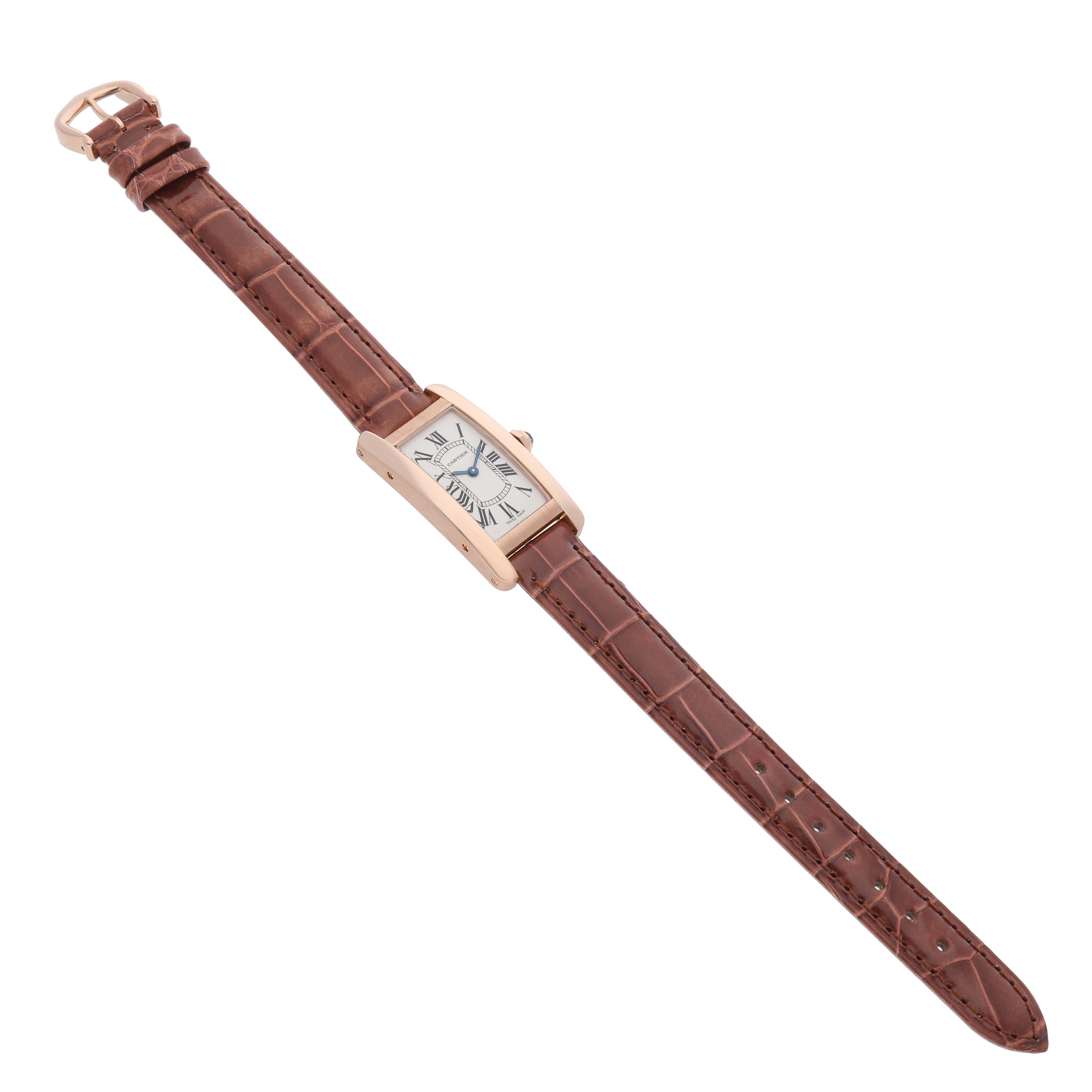 The Cartier Tank Americaine W2607456 Women's Rose Gold Silver Dial watch is shown from an overhead angle, displaying the entire face and brown leather strap.