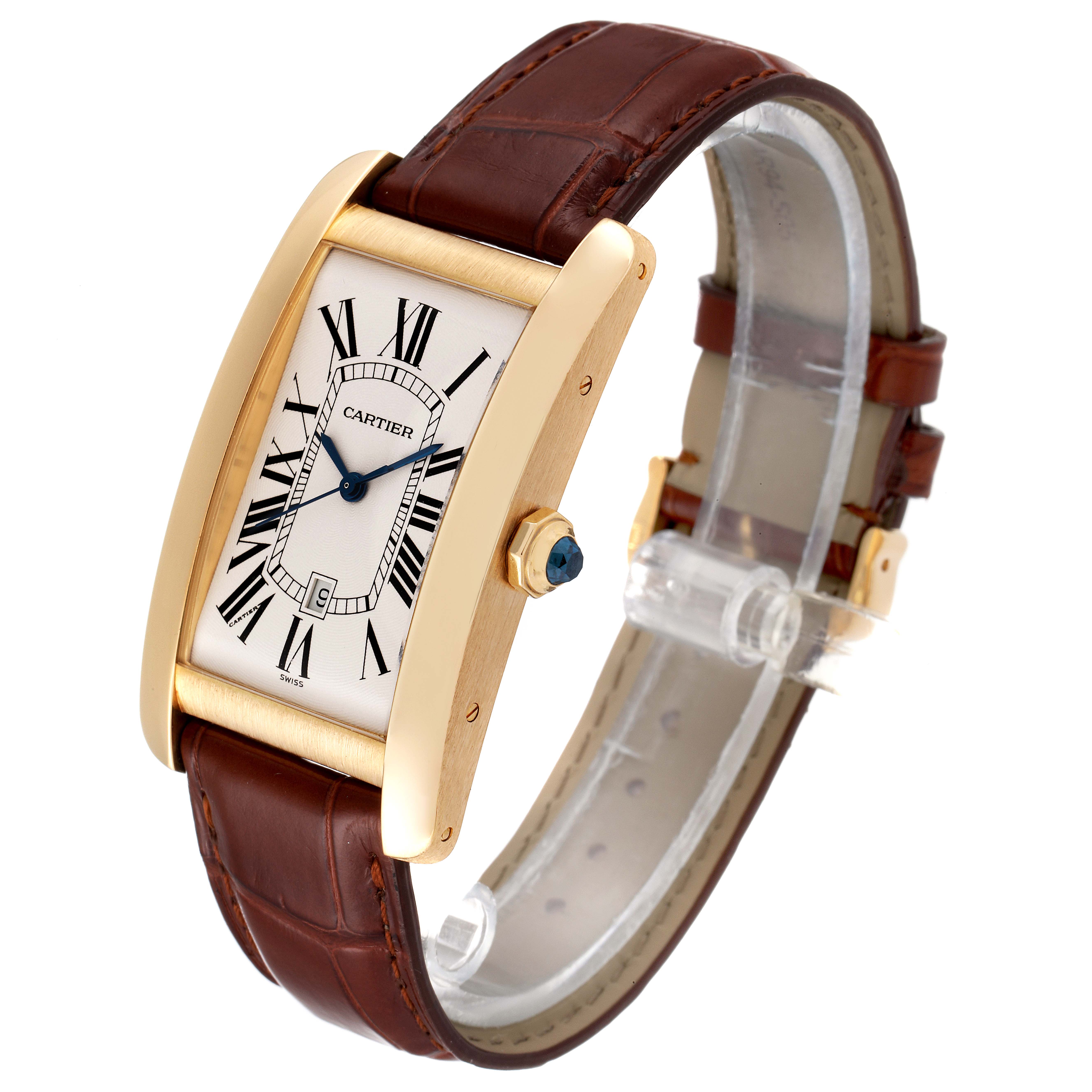 The Cartier Tank Americaine W2603156 Men
s Yellow Gold Silver Dial W2603156 Men
s Yellow Gold Silver Dial watch is shown from a three-quarter angle, displaying its face, bezel, crown, and leather strap.