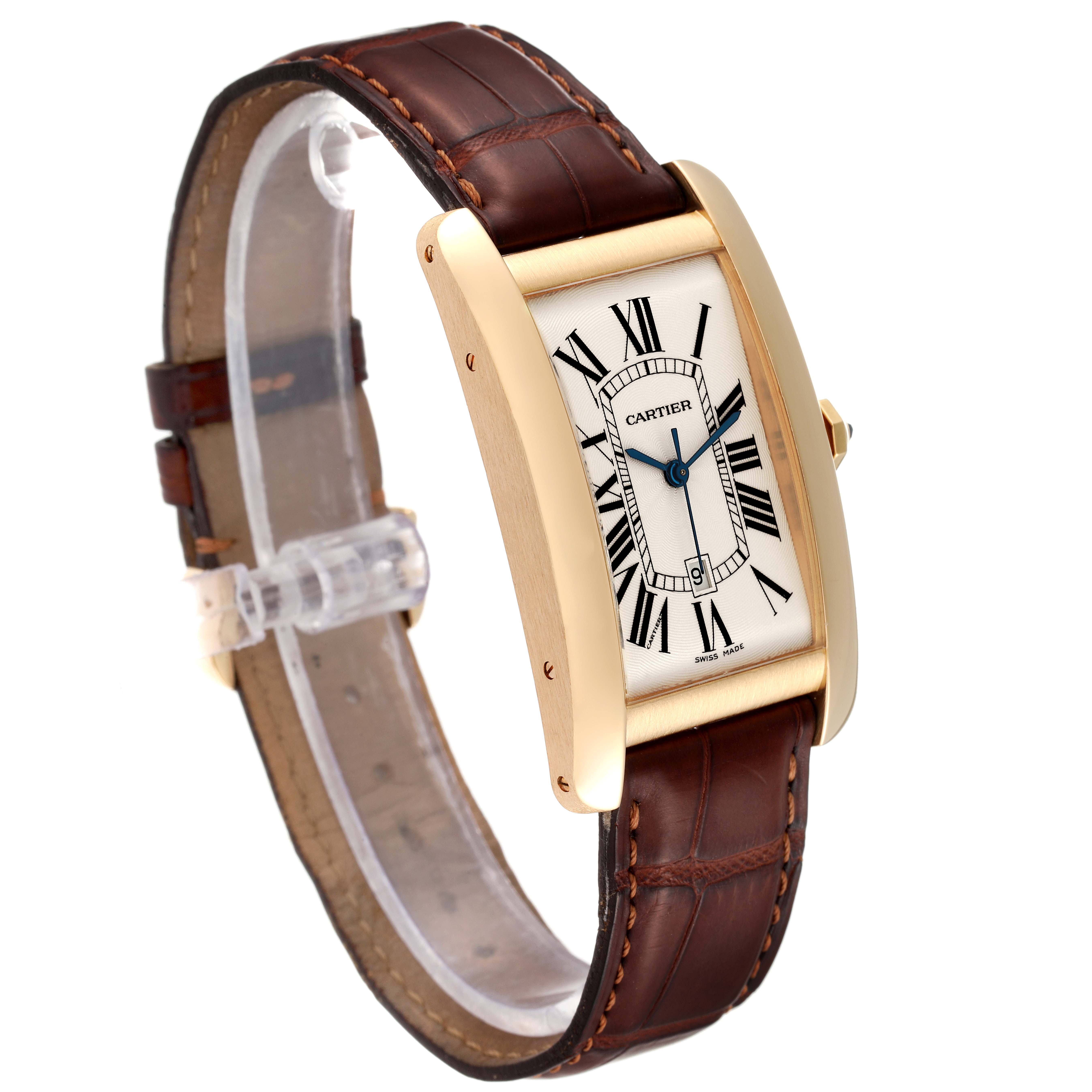 This Cartier Tank Americaine W2603156 Men's Yellow Gold Silver Dial W2603156 Men's Yellow Gold Silver Dial watch is shown at an angle highlighting the gold case, rectangular dial, and brown leather strap.