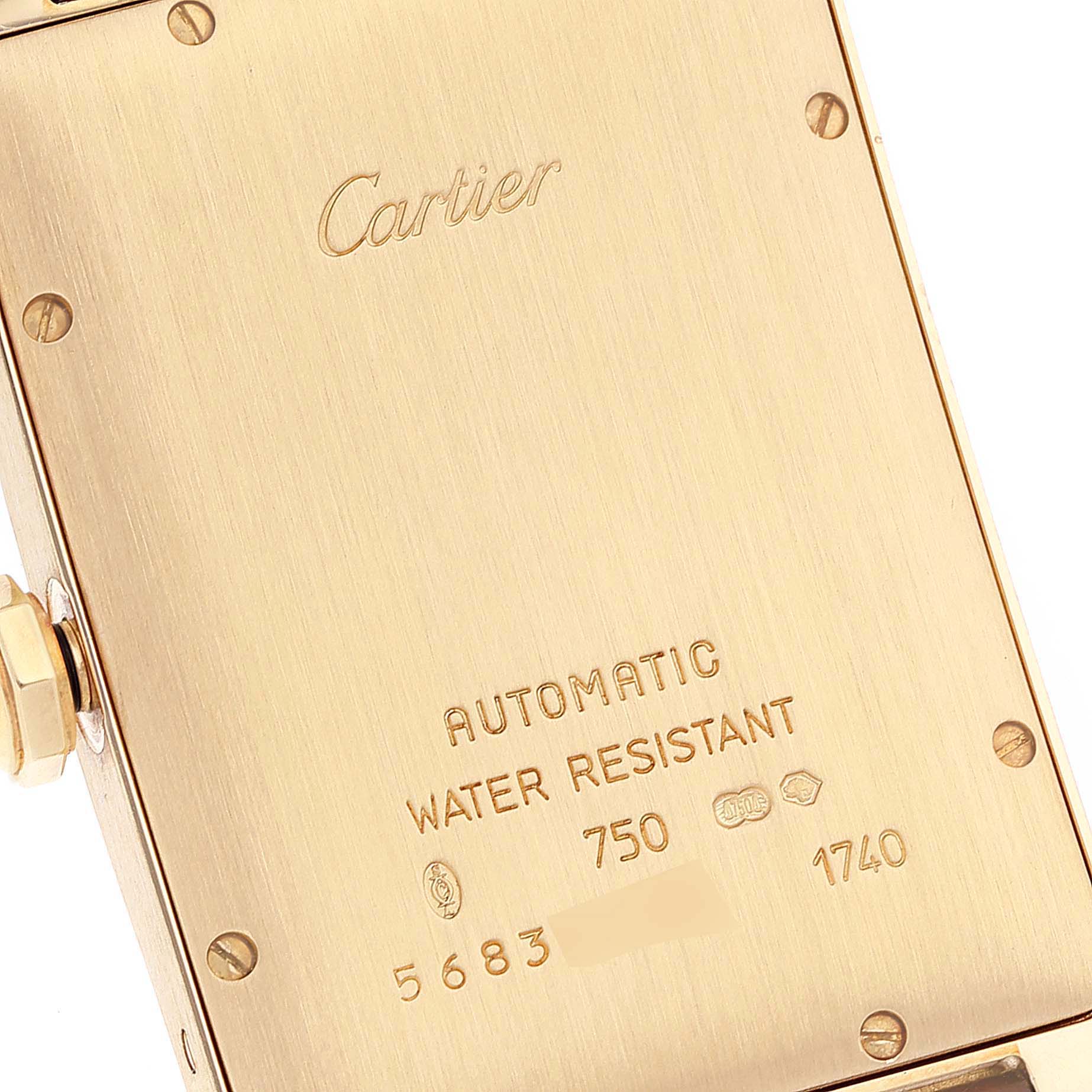 The image shows the back case of a Cartier Tank Americaine W2603156 Men's Yellow Gold Silver Dial W2603156 Men's Yellow Gold Silver Dial watch, highlighting the brand, material, and water resistance details.