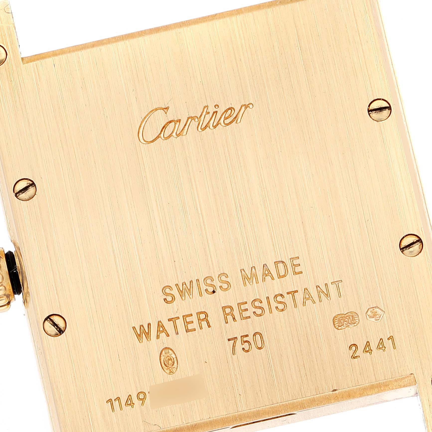 The image shows the back case of a Cartier Tank Louis W1529756 Men
s Yellow Gold Silver Dial W1529756 Men
s Yellow Gold Silver Dial watch, highlighting the brand, water resistance, and Swiss Made mark.