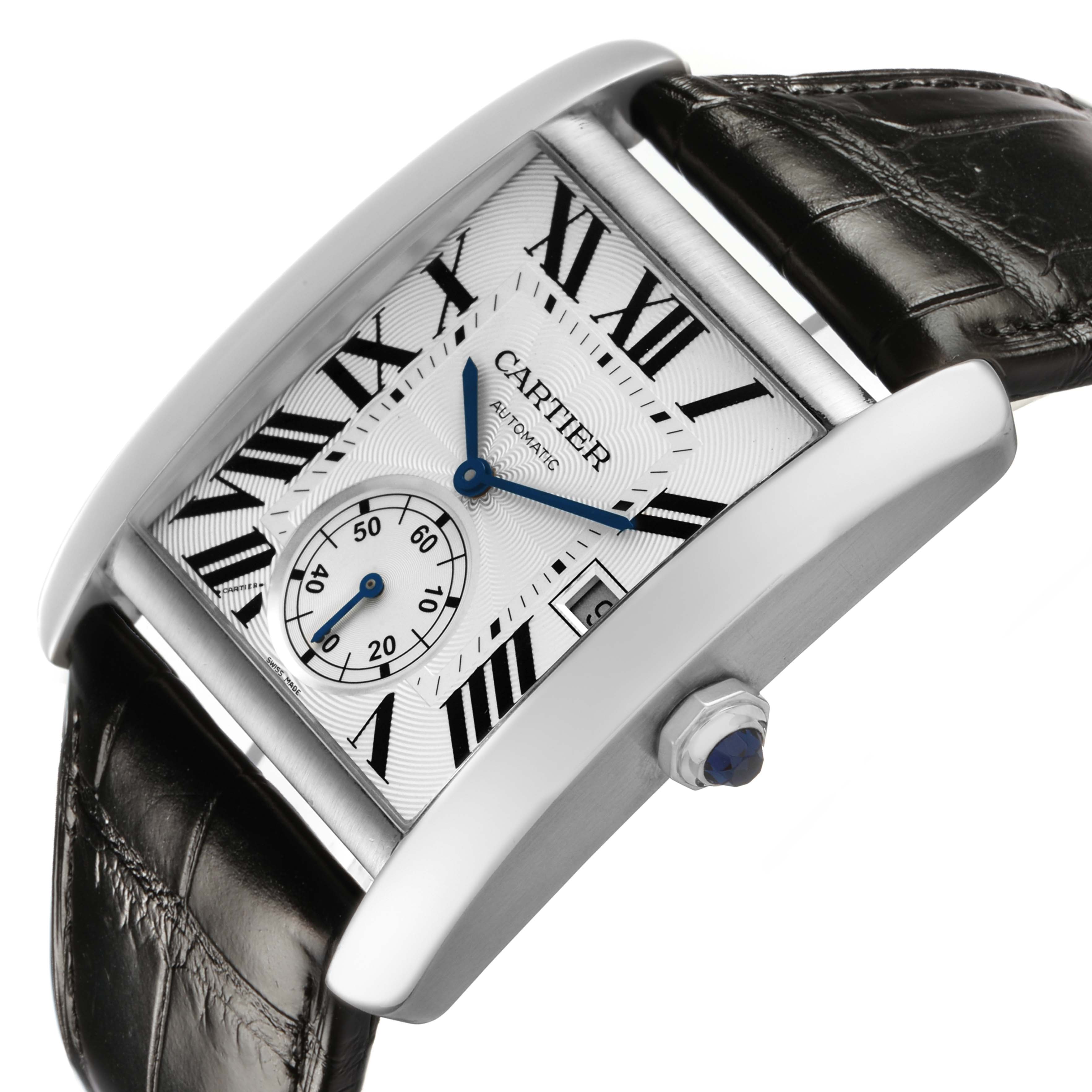 The Cartier Tank MC W5330003 Men's Stainless Steel Silver Dial watch is shown at an angle highlighting the face, black leather strap, and crown with a blue cabochon.
