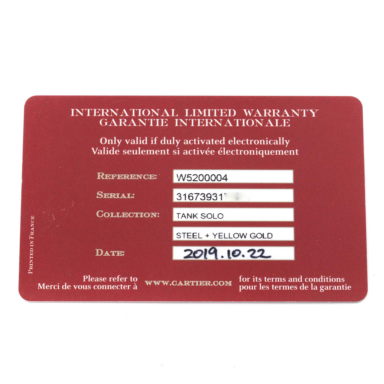 The image shows an international limited warranty card for the Cartier Tank Solo W5200004 Men's Yellow Gold Silver Dial W5200004 Men's Yellow Gold Silver Dial watch model.