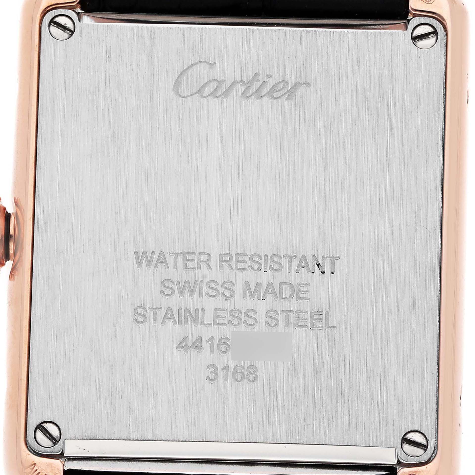 The image shows the back case of a Cartier Tank Solo W5200024 Women's Rose Gold Silver Dial watch, highlighting its water resistance and stainless steel.