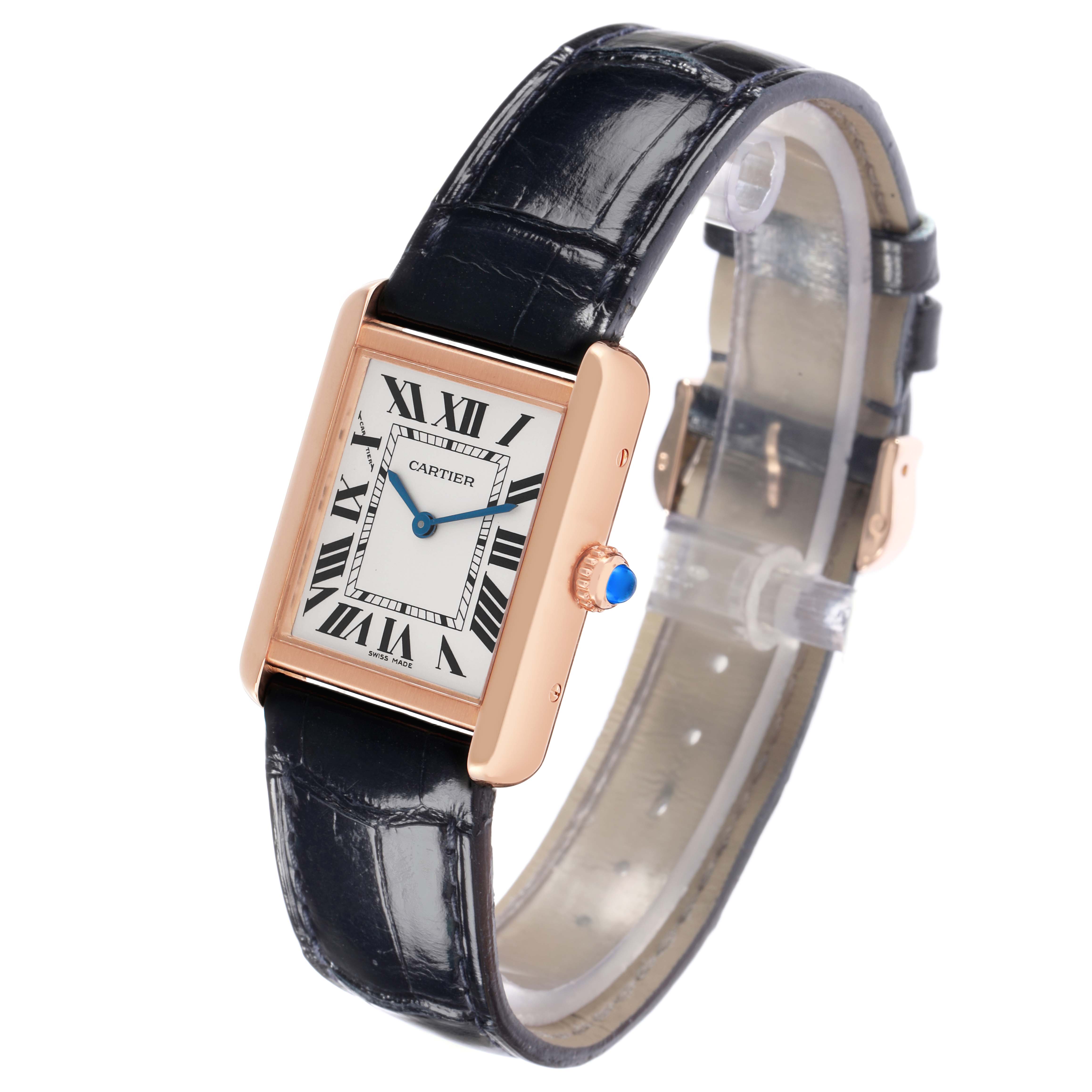 The Cartier Tank Solo W5200002 Women
s Rose Gold Silver Dial watch is shown at an angled perspective displaying the face, strap, and side view of the crown.