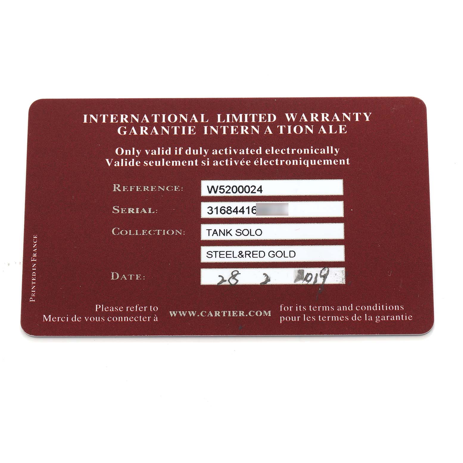 The image shows an International Limited Warranty card for a Cartier Tank Solo W5200024 Women
s Rose Gold Silver Dial watch.