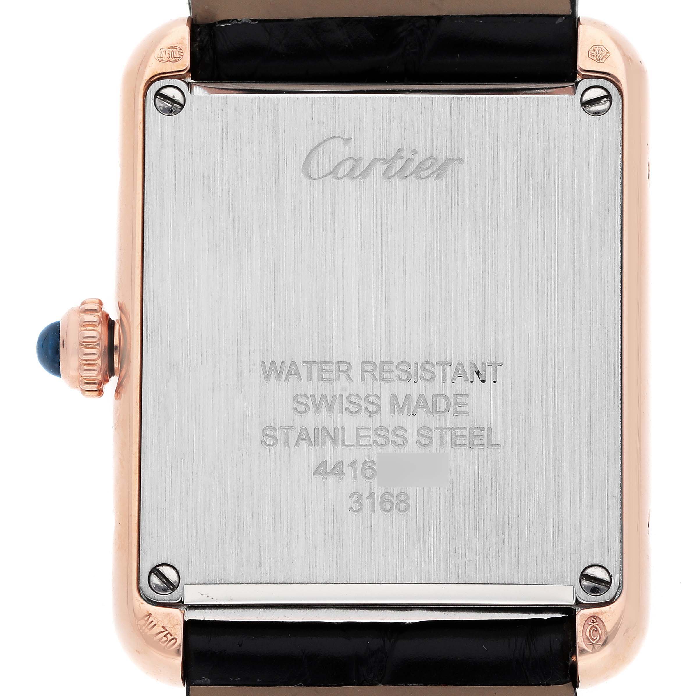 The image shows the back of a Cartier Tank Solo W5200024 Women
s Rose Gold Silver Dial watch, displaying the brand name, material specifications, and crown detail.