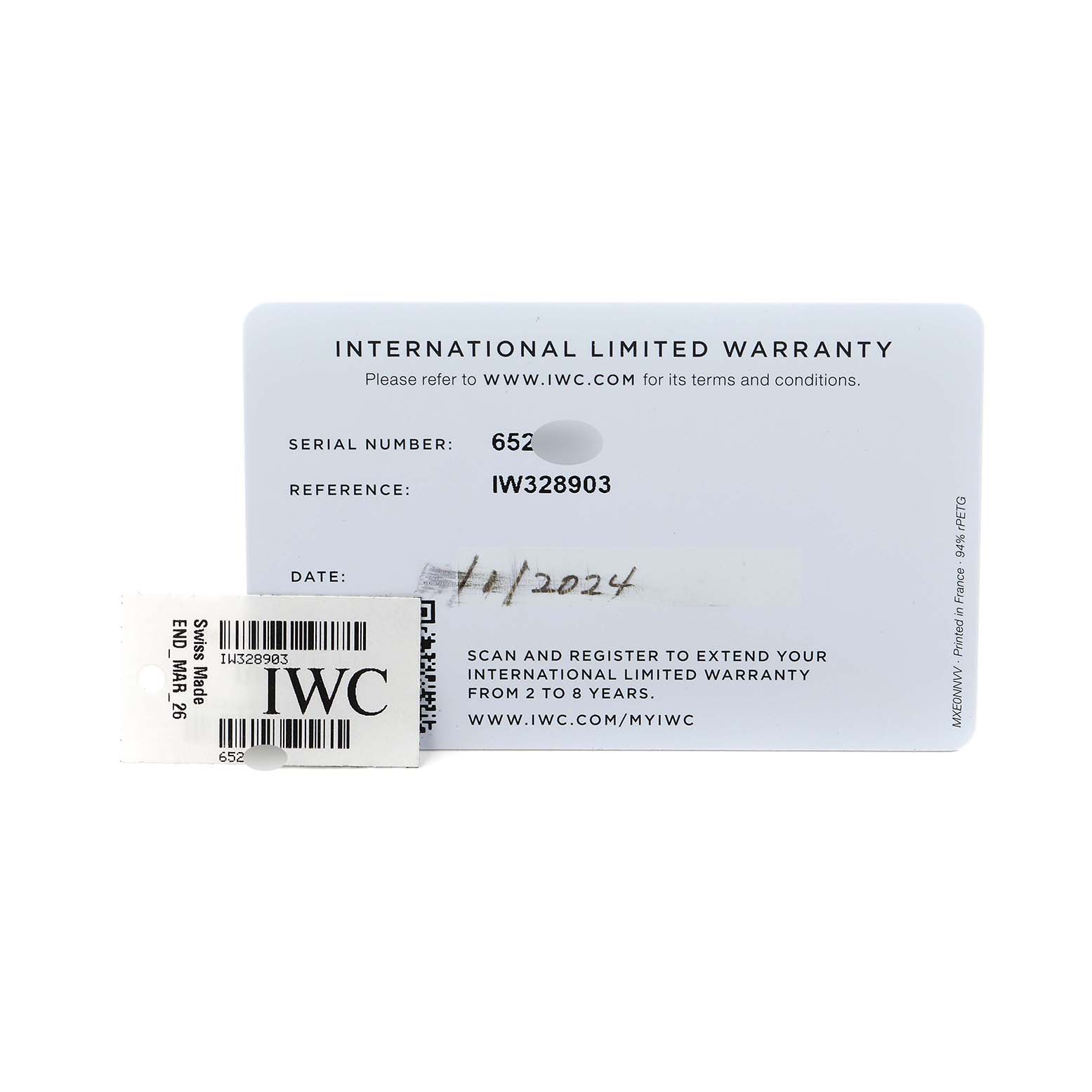 The image shows the IWC Ingenieur IW328903 Men
s Stainless Steel Blue Dial model
s warranty card and a small tag, viewed from the top.