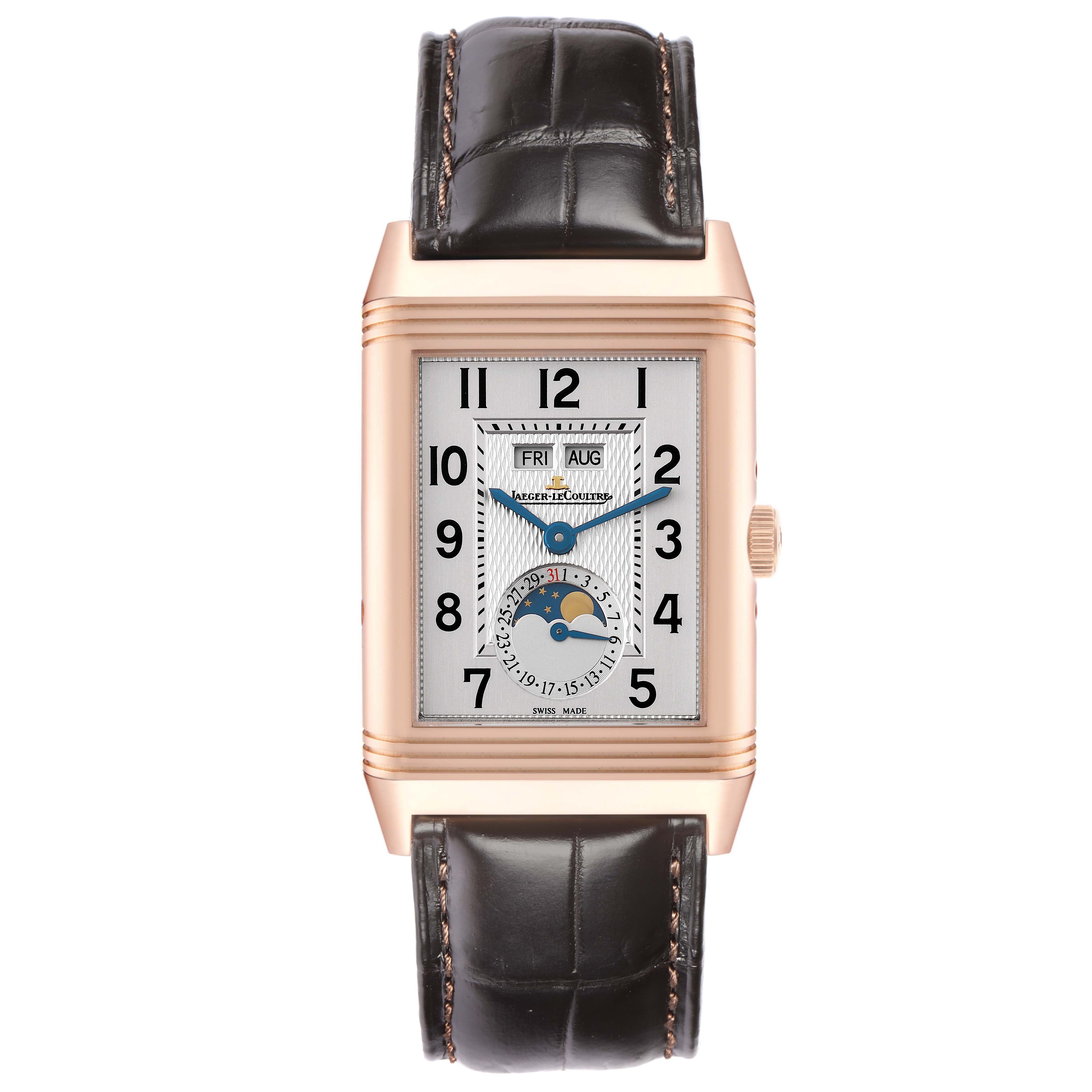 The Jaeger-LeCoultre Reverso model is shown from a front angle, displaying the dial, hands, subdials, and leather strap.
