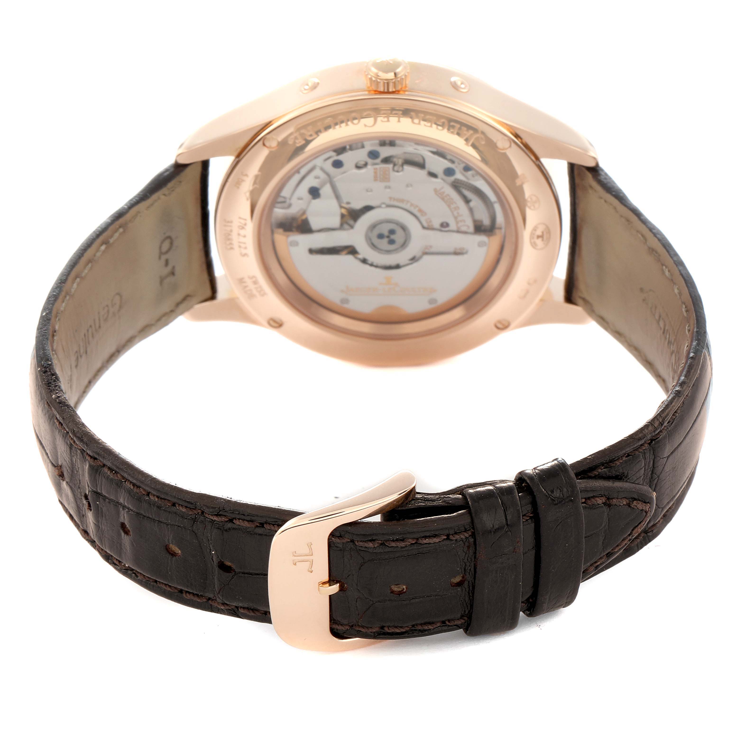 The image shows the Jaeger-LeCoultre Master model from the back, revealing the movement and leather strap with clasp.