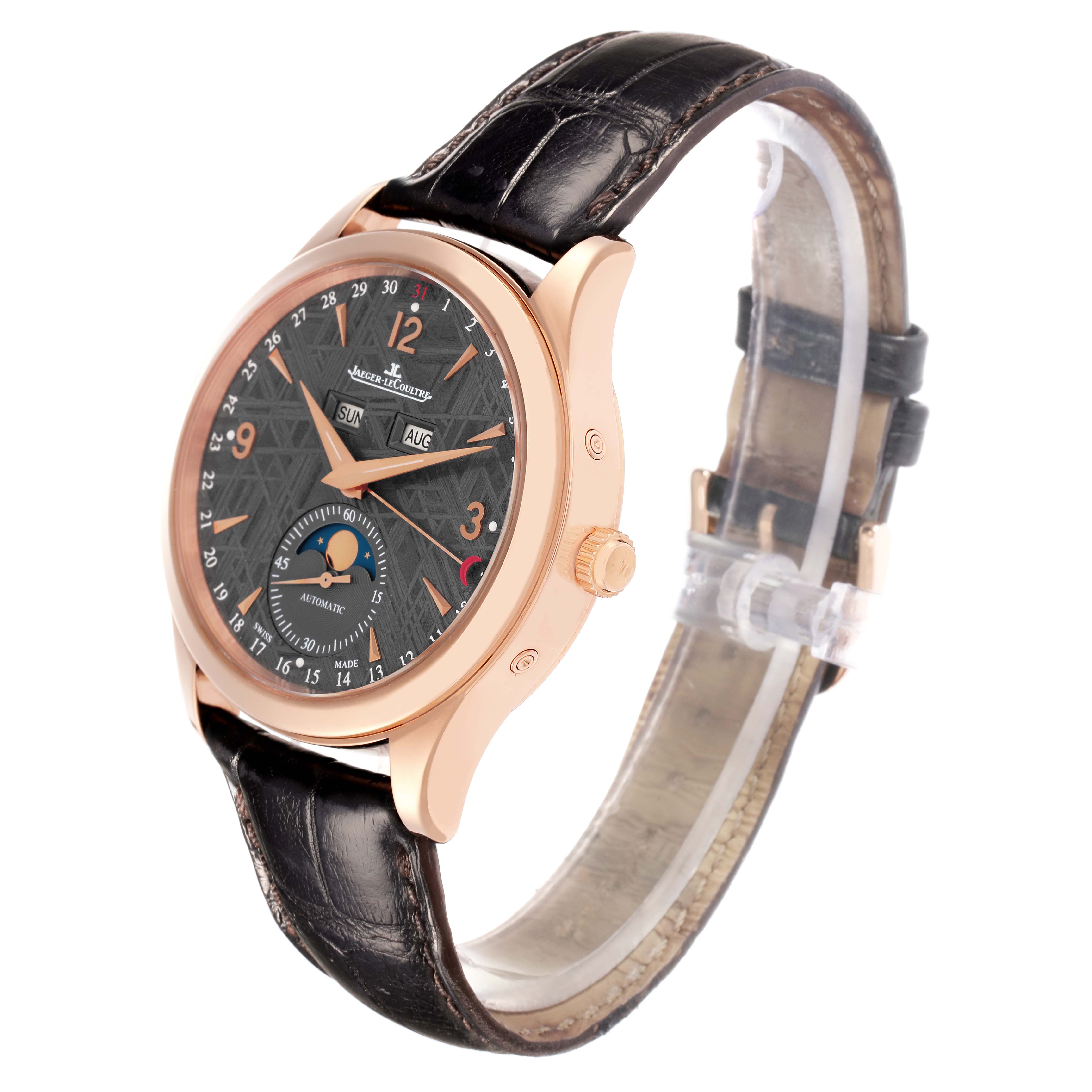 The Jaeger LeCoultre Master Q1552540 Men's Rose Gold Grey Dial watch is shown at an angled side view, featuring its dial, crown, and leather strap.