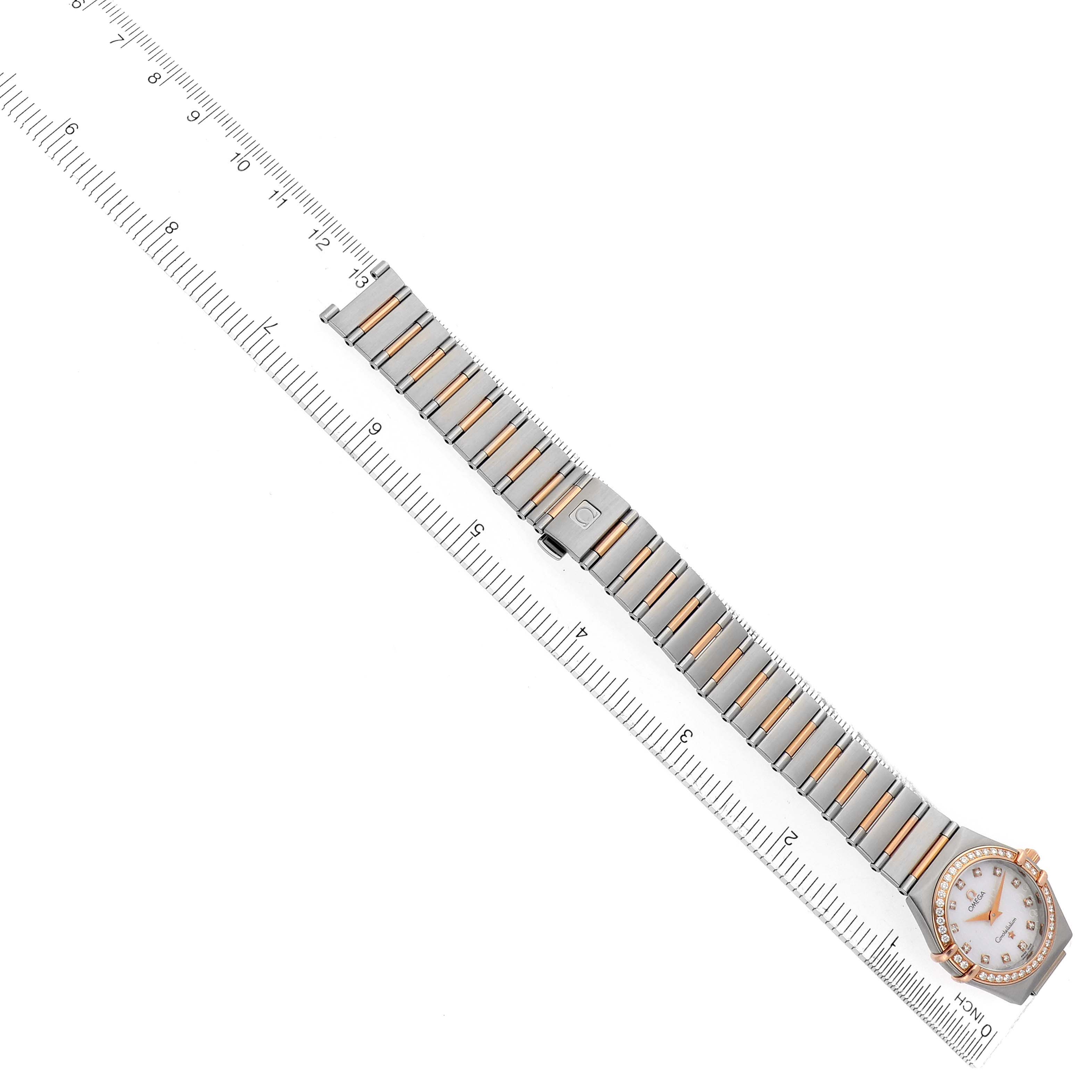 The Omega 13660.75.00 Women
s Steel and Gold (two tone) Mother of Pearl Dial Constellation My Choice Steel Rose Gold Diamond Watch 1360.75.00 is shown laid flat, displaying the full bracelet and face.