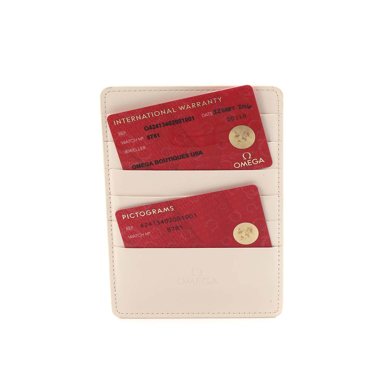 The image shows an Omega De Ville 424.13.40.20.01.001 Men
s Stainless Steel Black Dial watch holder with red International Warranty and Pictograms cards.