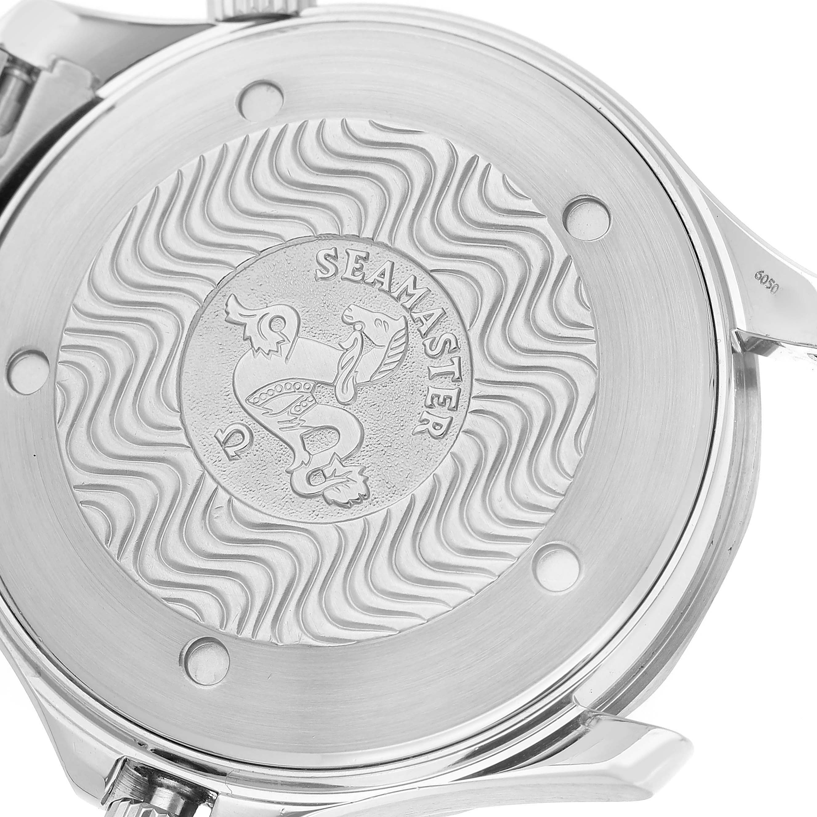 The image shows the case back of an Omega Seamaster 2531.80.00 Men's Stainless Steel Blue Dial watch, featuring engraved patterns and branding.