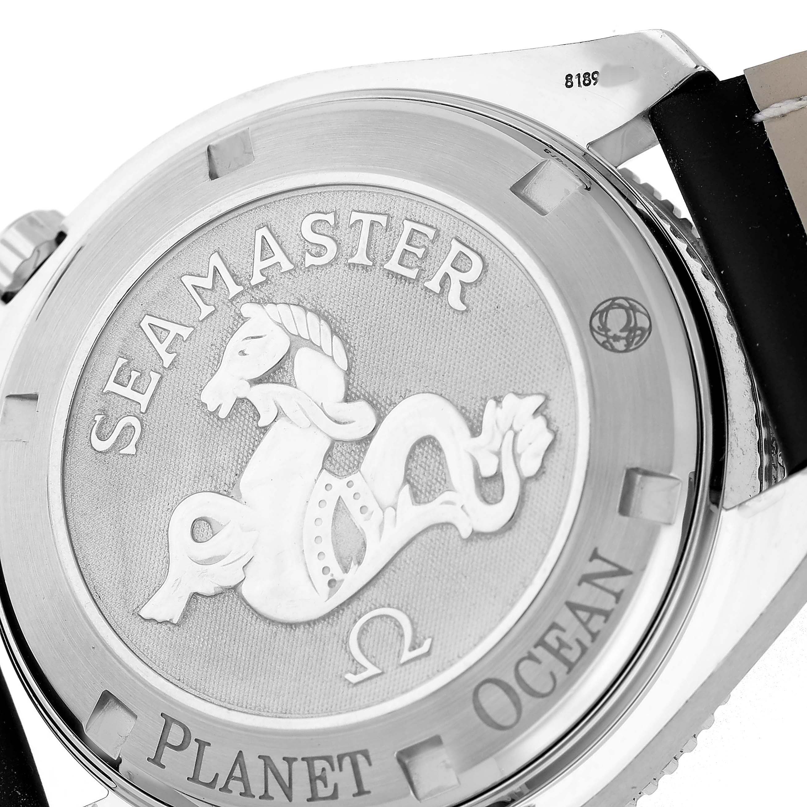 The image shows the back case of an Omega Planet Ocean 2201.50.00 Men's Stainless Steel Black Dial watch with engraved "Seamaster" branding.
