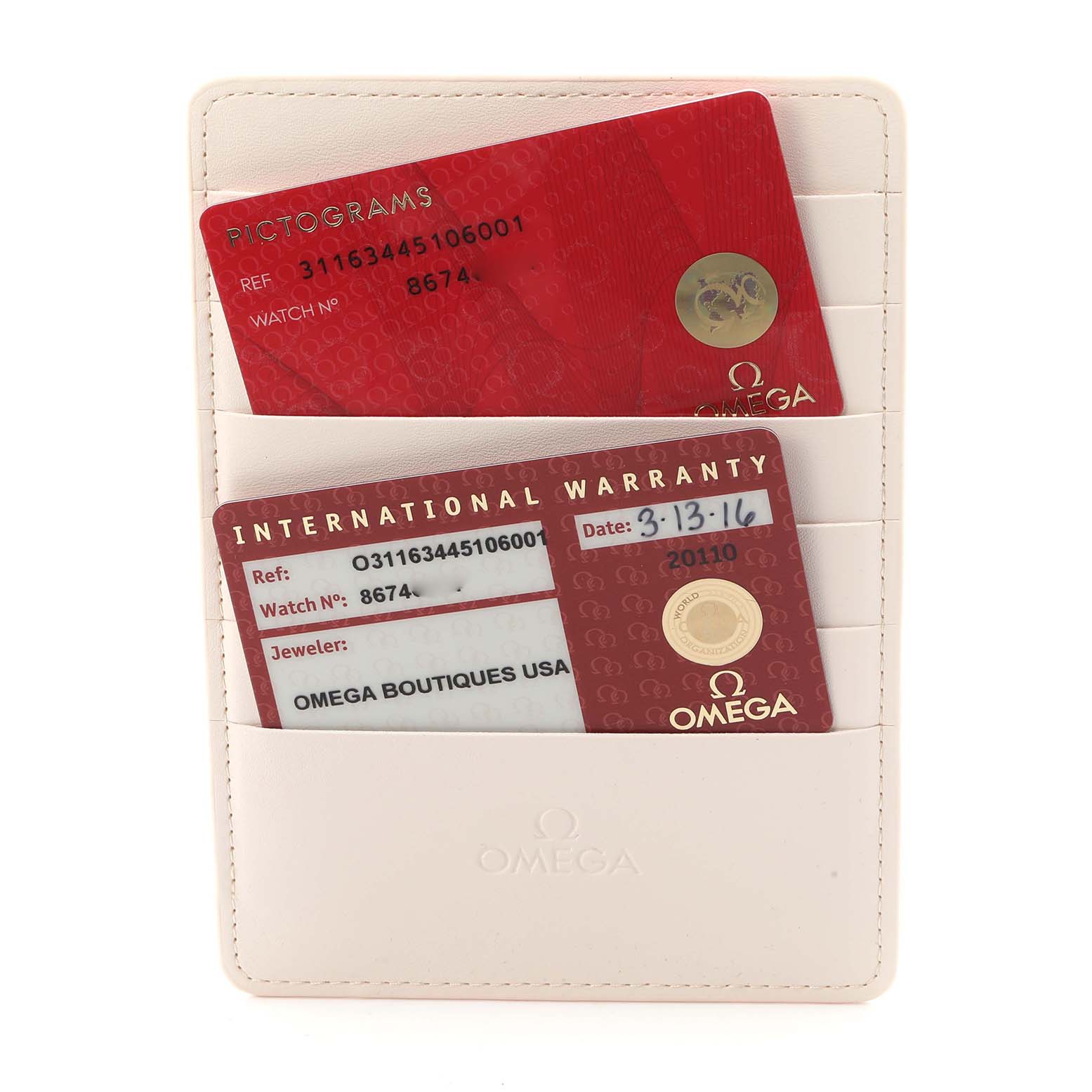 The image shows a warranty card holder for the Omega Speedmaster 311.63.44.51.06.001 Men
s Ceramic Black Dial, featuring pictograms and an international warranty card.