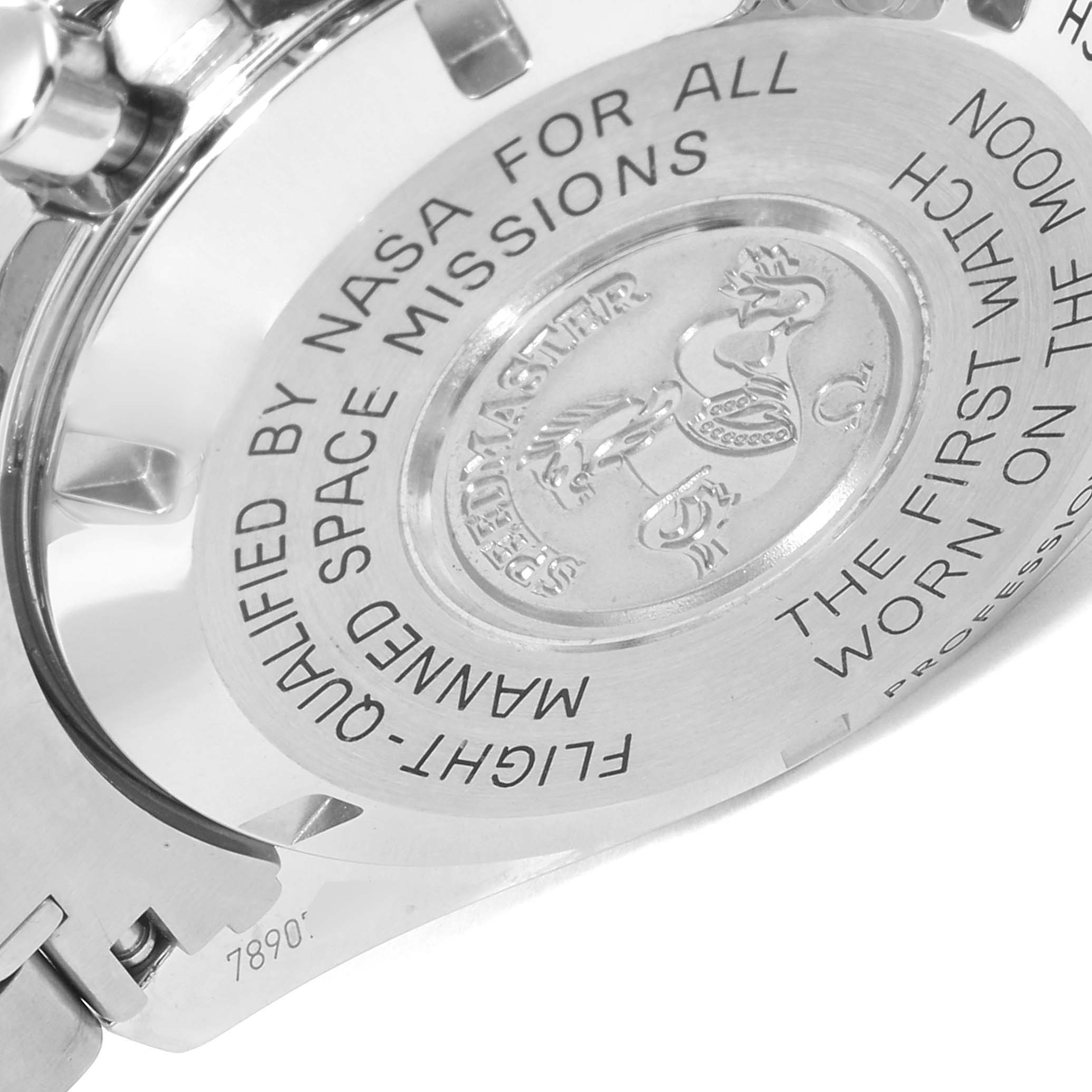 This image shows the engraved case back of an Omega Speedmaster 311.30.42.30.01.005 Men
s Stainless Steel Black Dial 311.30.42.30.01.005 Men
s Stainless Steel Black Dial watch, highlighting its commemorative inscriptions.