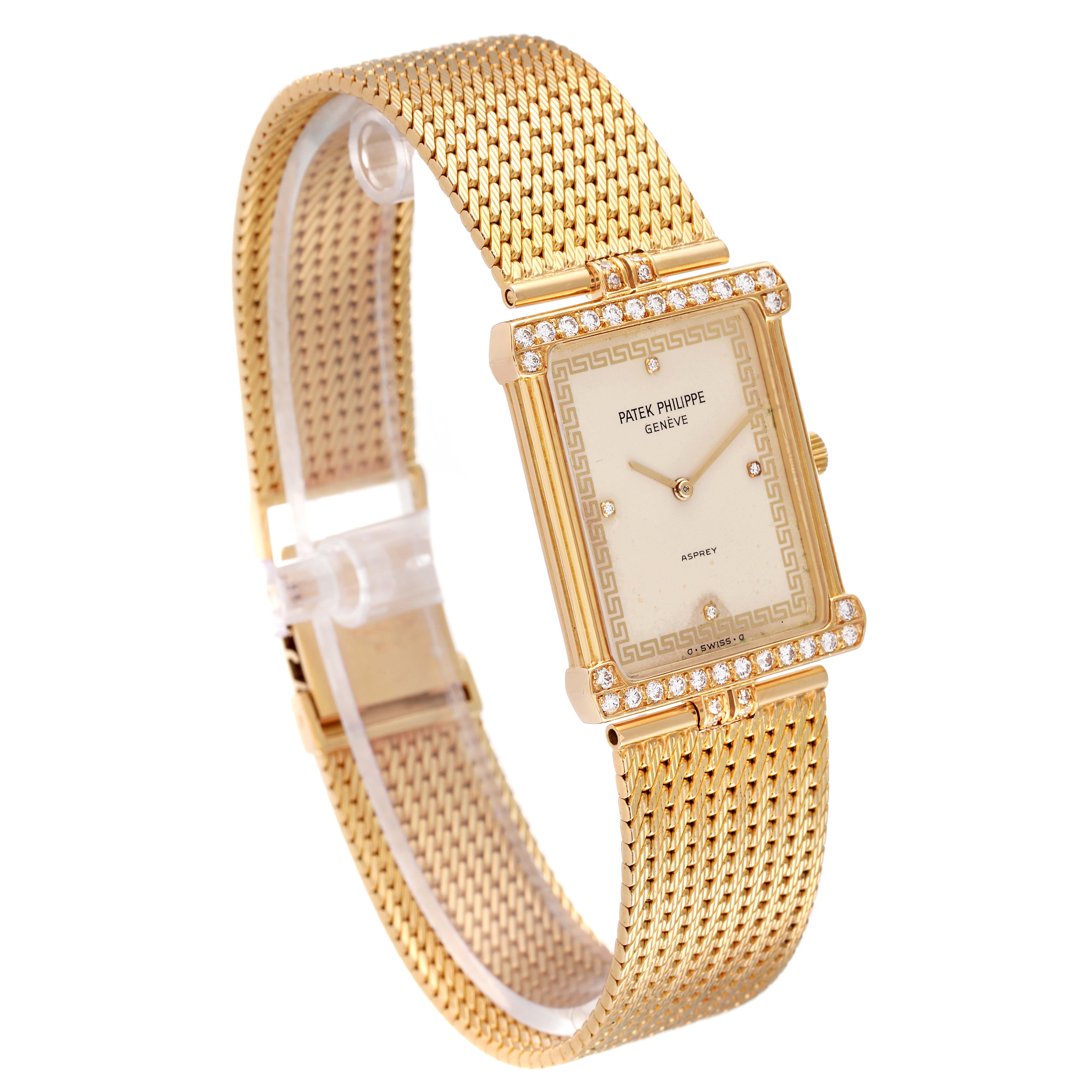 This image shows a front angle of the Patek Philippe Gondolo 3776/2 Men's Yellow Gold Beige Dial 3776/2 Men's Yellow Gold Beige Dial watch, highlighting its gold case, bracelet, and diamond accents.