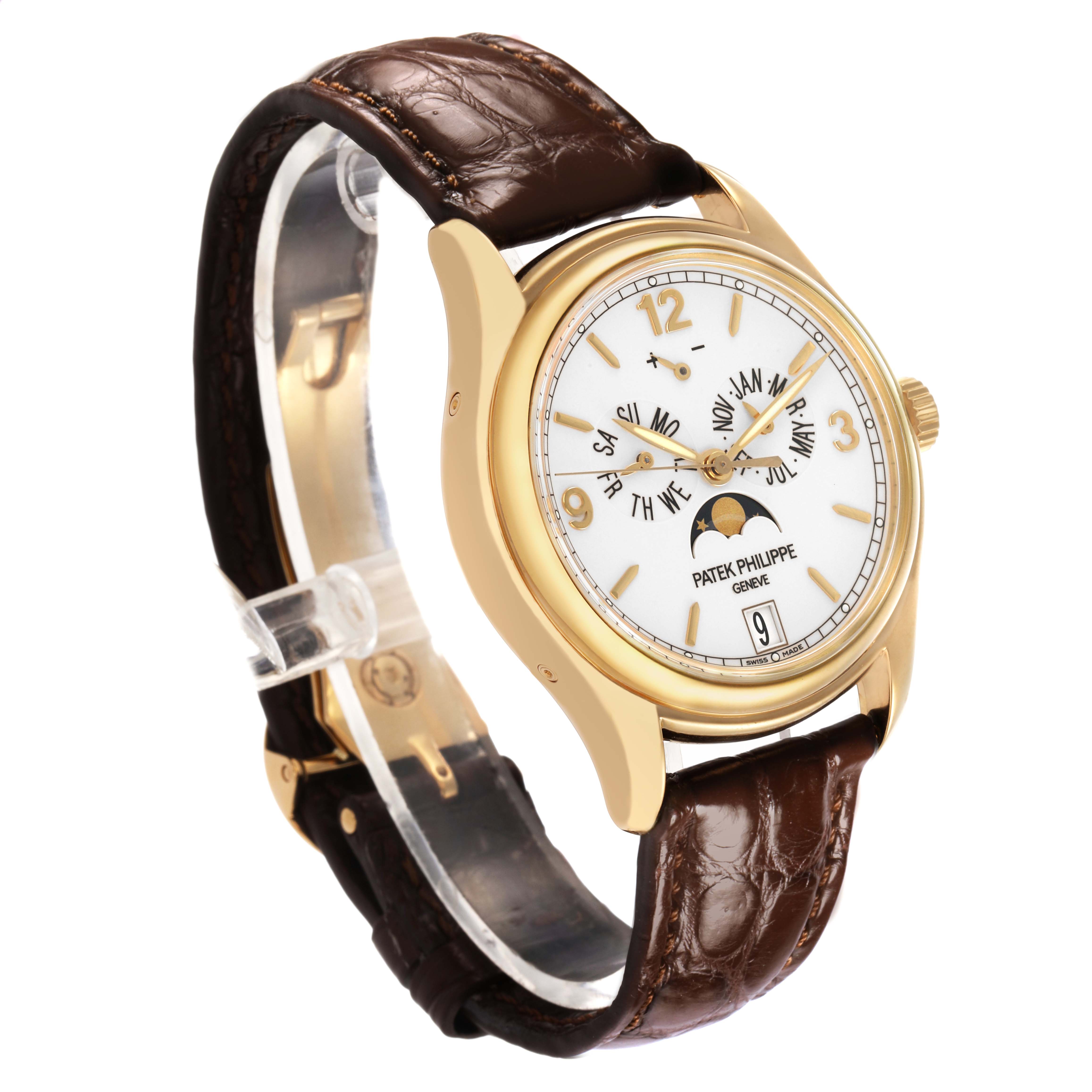 The Patek Philippe Complications 5146J-001 Men's Yellow Gold Beige Dial watch is shown at an angled side view, highlighting the dial, hands, crown, and brown leather strap.