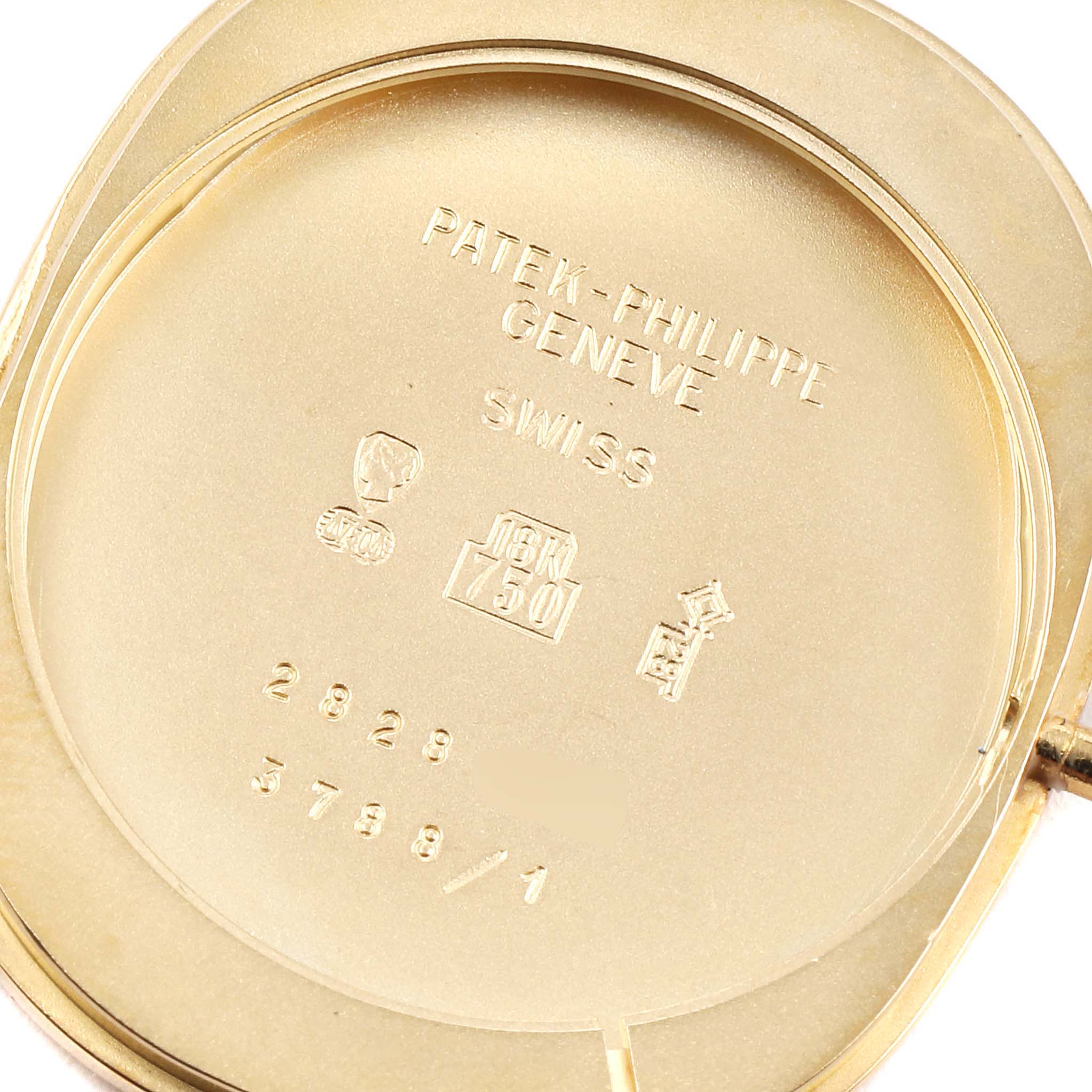 This image shows the inside back case of a Patek Philippe Golden Ellipse 3788 Women's Yellow Gold Blue Dial 3788 Women's Yellow Gold Blue Dial watch, displaying model identification and hallmark engravings.