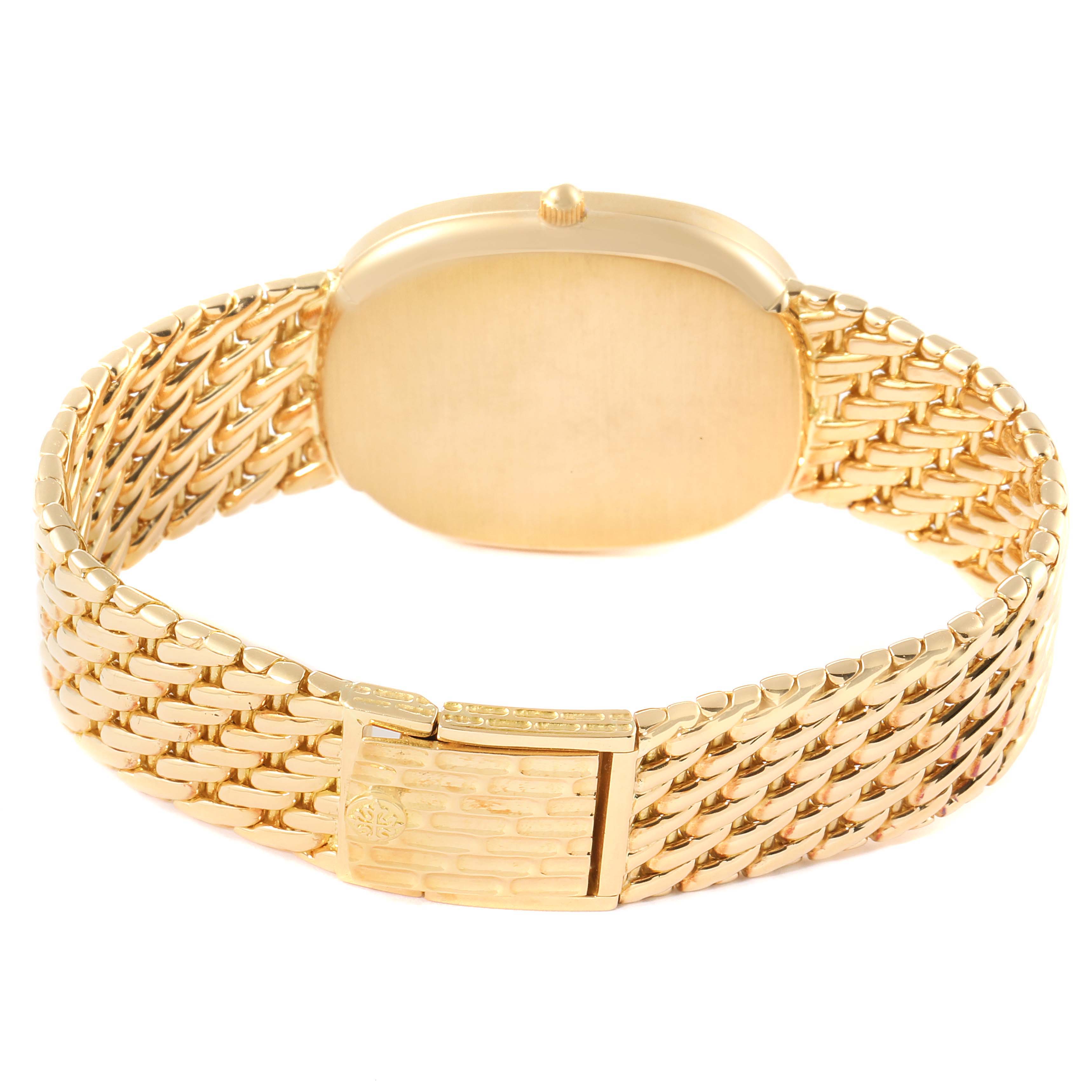 The image shows the back view of a Patek Philippe Golden Ellipse 3747/17 Men's Yellow Gold Beige Dial 3747/17 Men's Yellow Gold Beige Dial watch, highlighting the gold case, crown, and woven bracelet.