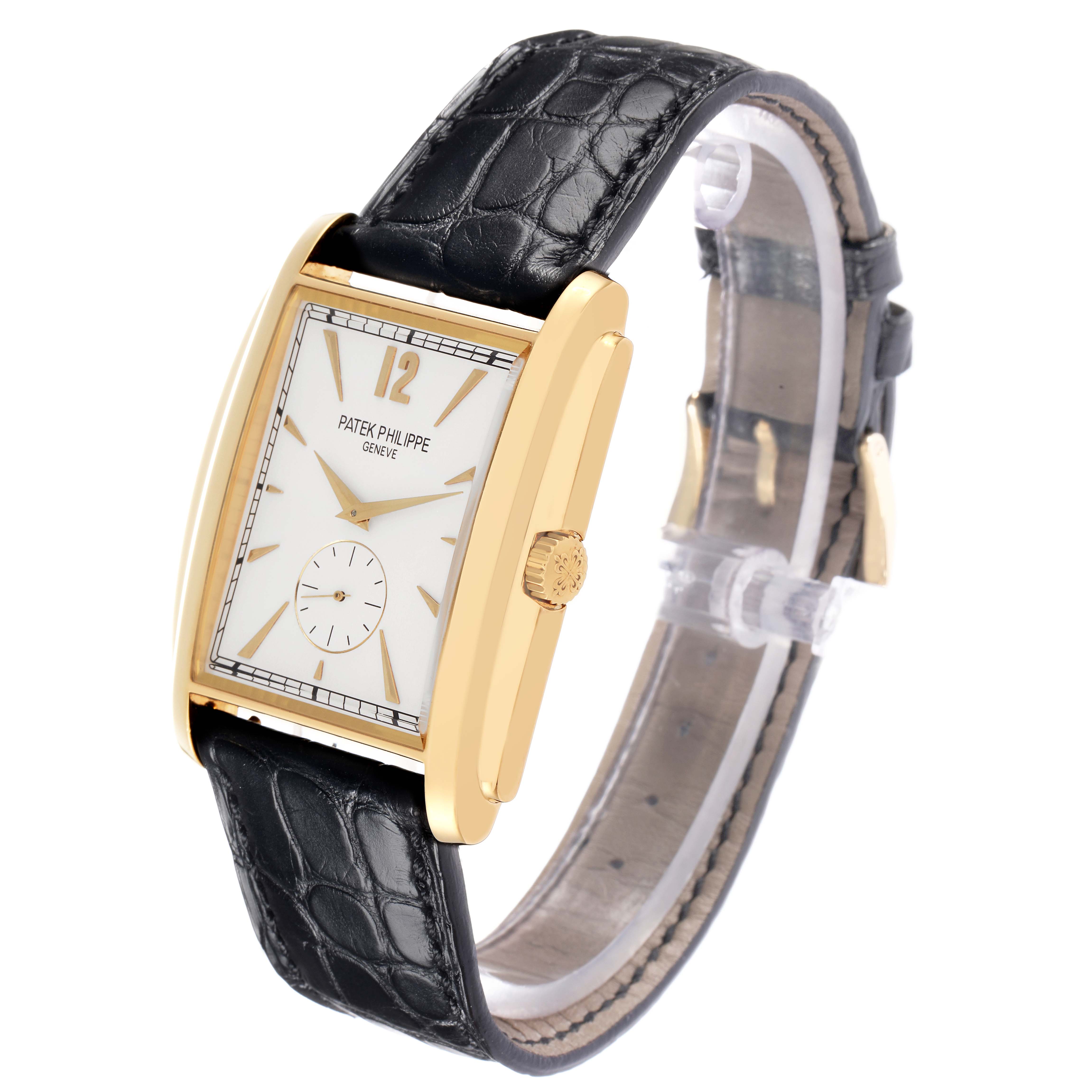 The image shows a side angle of the Patek Philippe Gondolo 5124 Men
s Yellow Gold Silver Dial watch, highlighting its gold case, crown, and black leather strap.