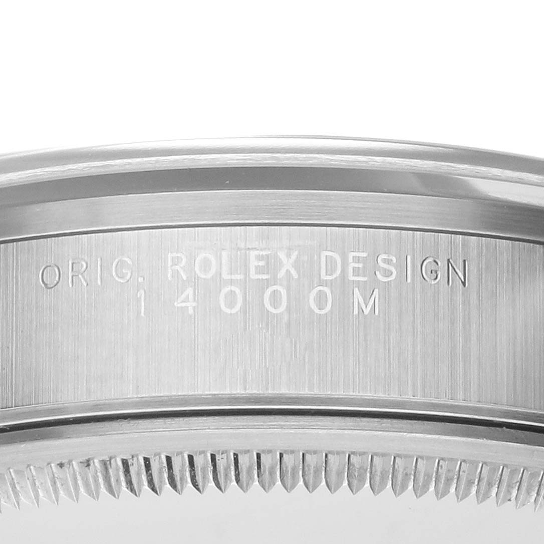 This image shows a close-up of the case side of the Rolex Air-King 14000M Men's Stainless Steel Black Dial 14000M Men's Stainless Steel Black Dial watch, highlighting the engraving "ORIG. ROLEX DESIGN 14000M".