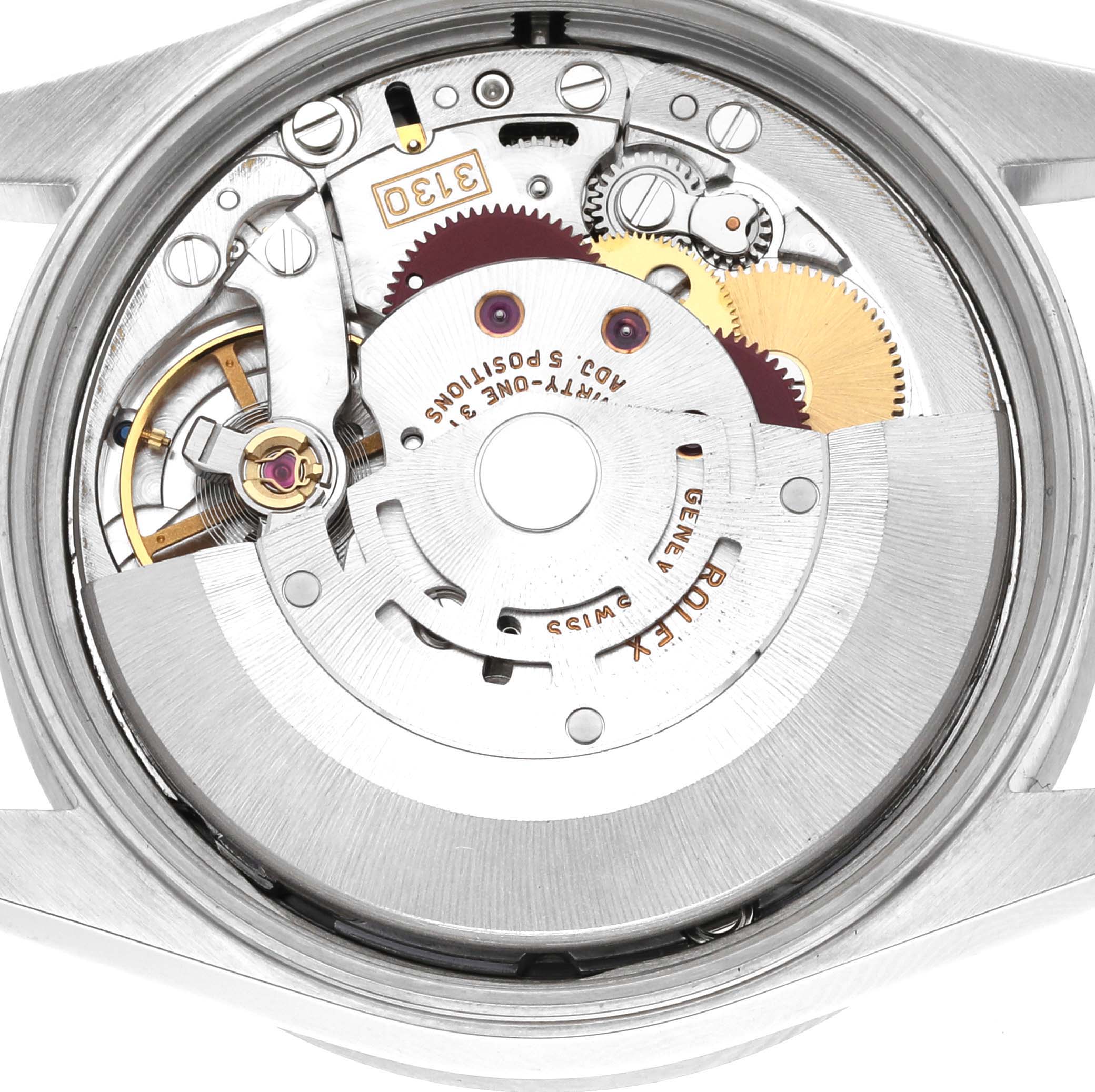 The image shows a top-down view of the internal mechanism of a Rolex Air-King 14010M Men's Stainless Steel Black Dial 14010M Men's Stainless Steel Black Dial watch.