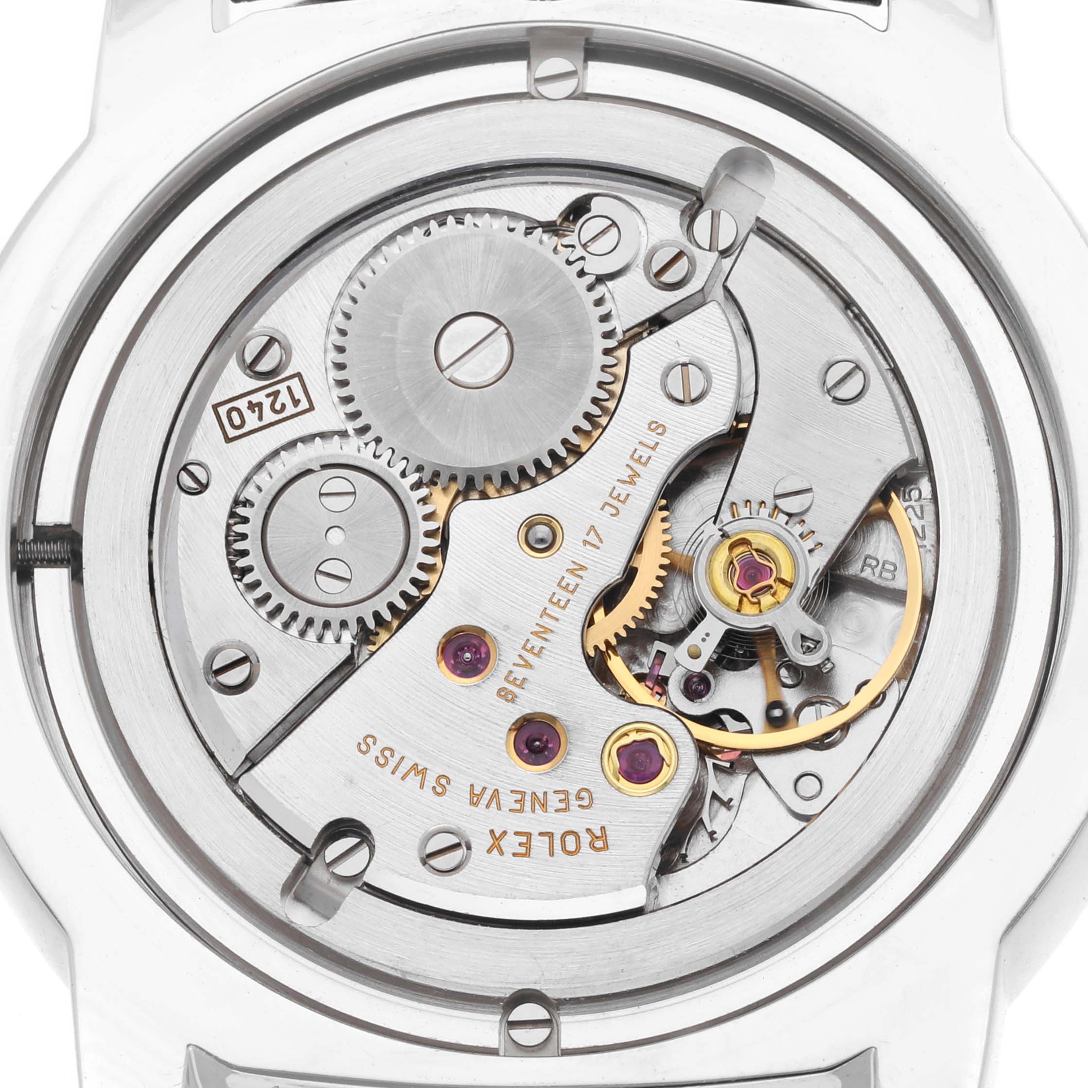 The image shows the back view of a Rolex Cellini 5241 Men
s Platinum Silver Dial watch, highlighting its intricate movement and mechanics.