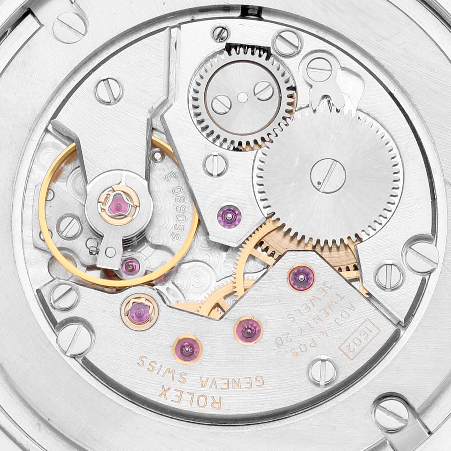 The image shows the intricate internal mechanism of a Rolex Cellini 5115 Men
s White Gold Silver Dial 5115 Men
s White Gold Silver Dial model watch, focusing on gears and components from a close-up angle.