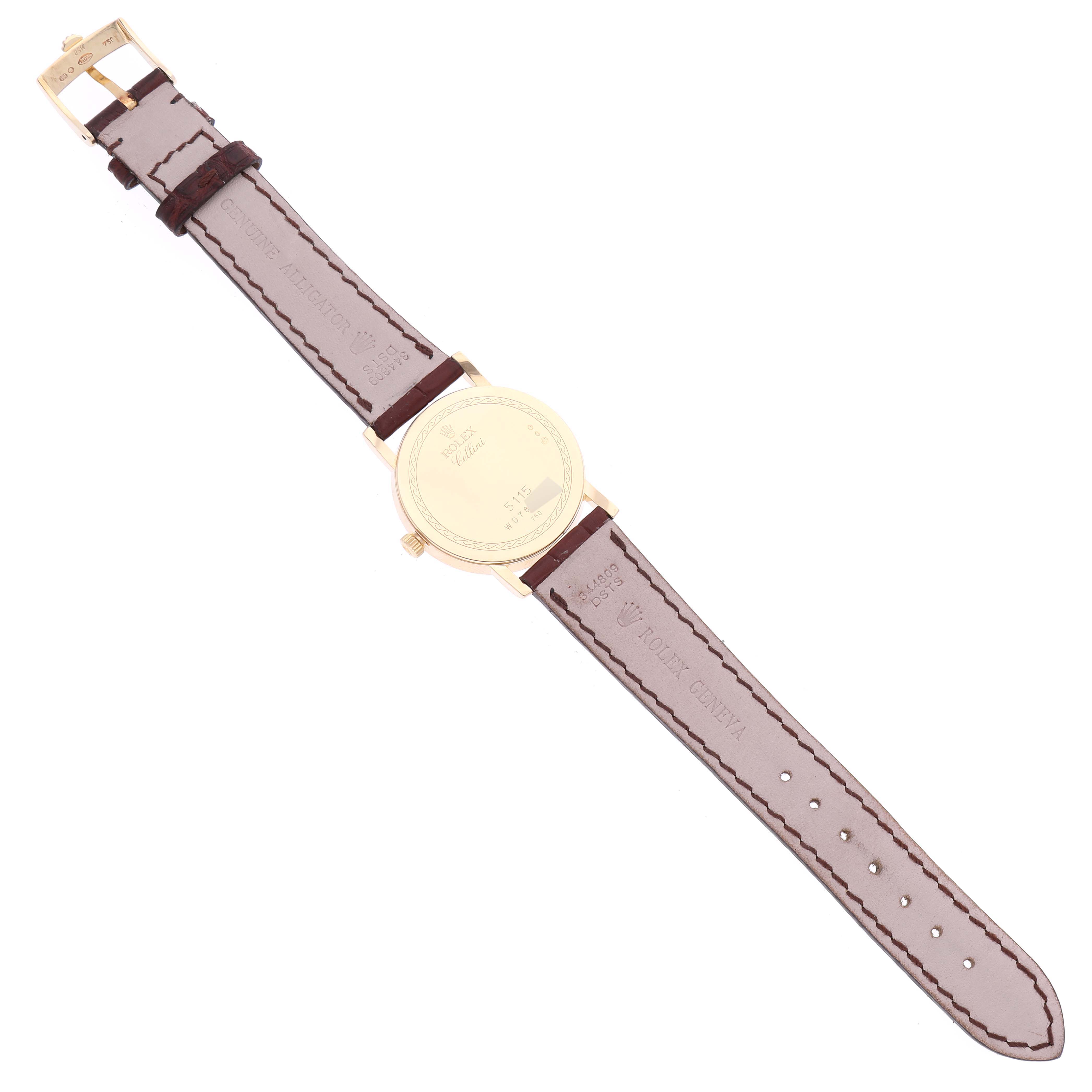 The image shows the back view of a Rolex Cellini 5115 Men's Yellow Gold Champagne Dial 5115 Men's Yellow Gold Champagne Dial watch with its leather strap fully visible.