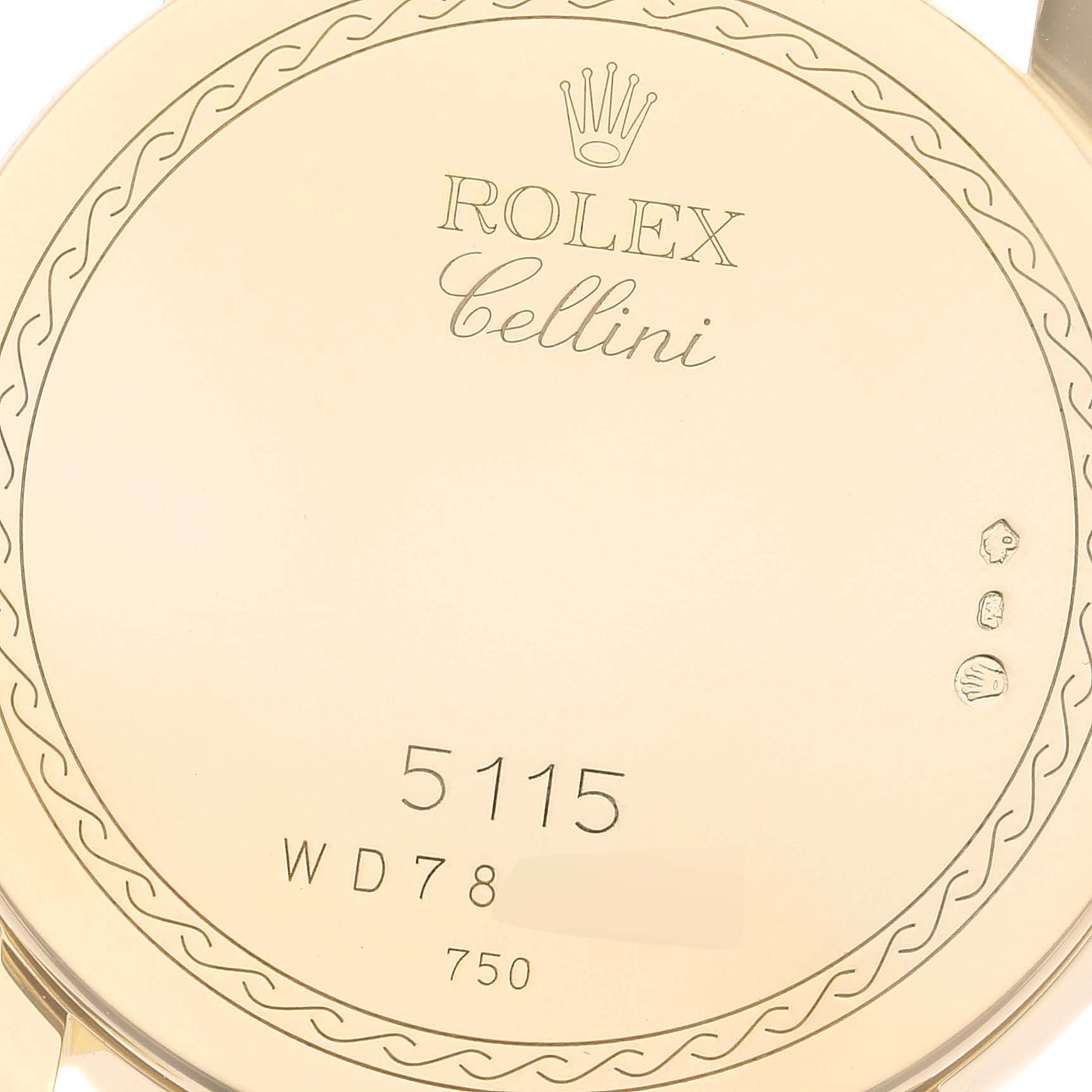 The image shows the back case of a Rolex Cellini 5115 Men's Yellow Gold Champagne Dial 5115 Men's Yellow Gold Champagne Dial watch with branding, model number 5115, and hallmark details.