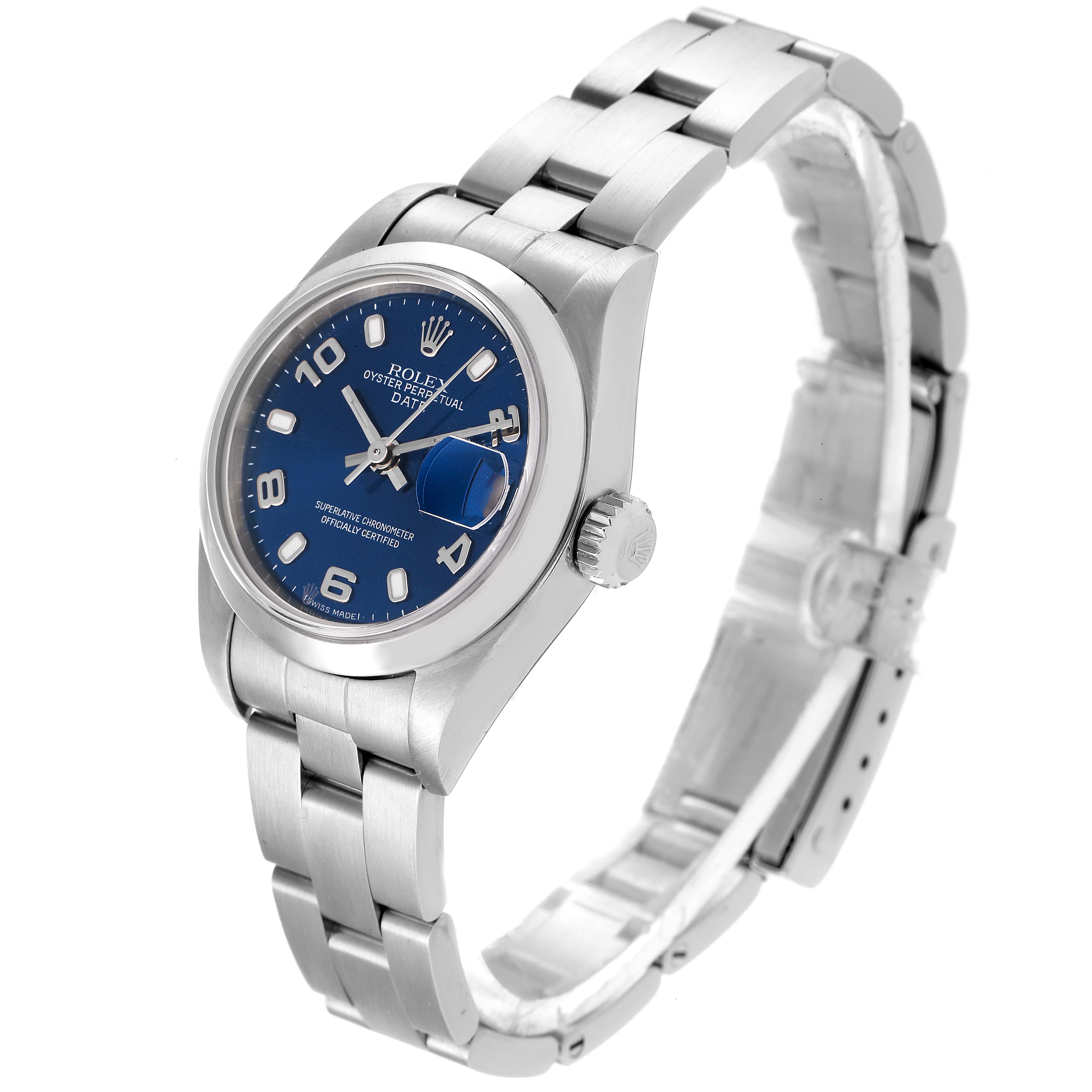 The Rolex Date 79160 Women's Stainless Steel Blue Dial 79160 Women's Stainless Steel Blue Dial model watch is shown from an angled view, highlighting the face, crown, and partially opened bracelet.