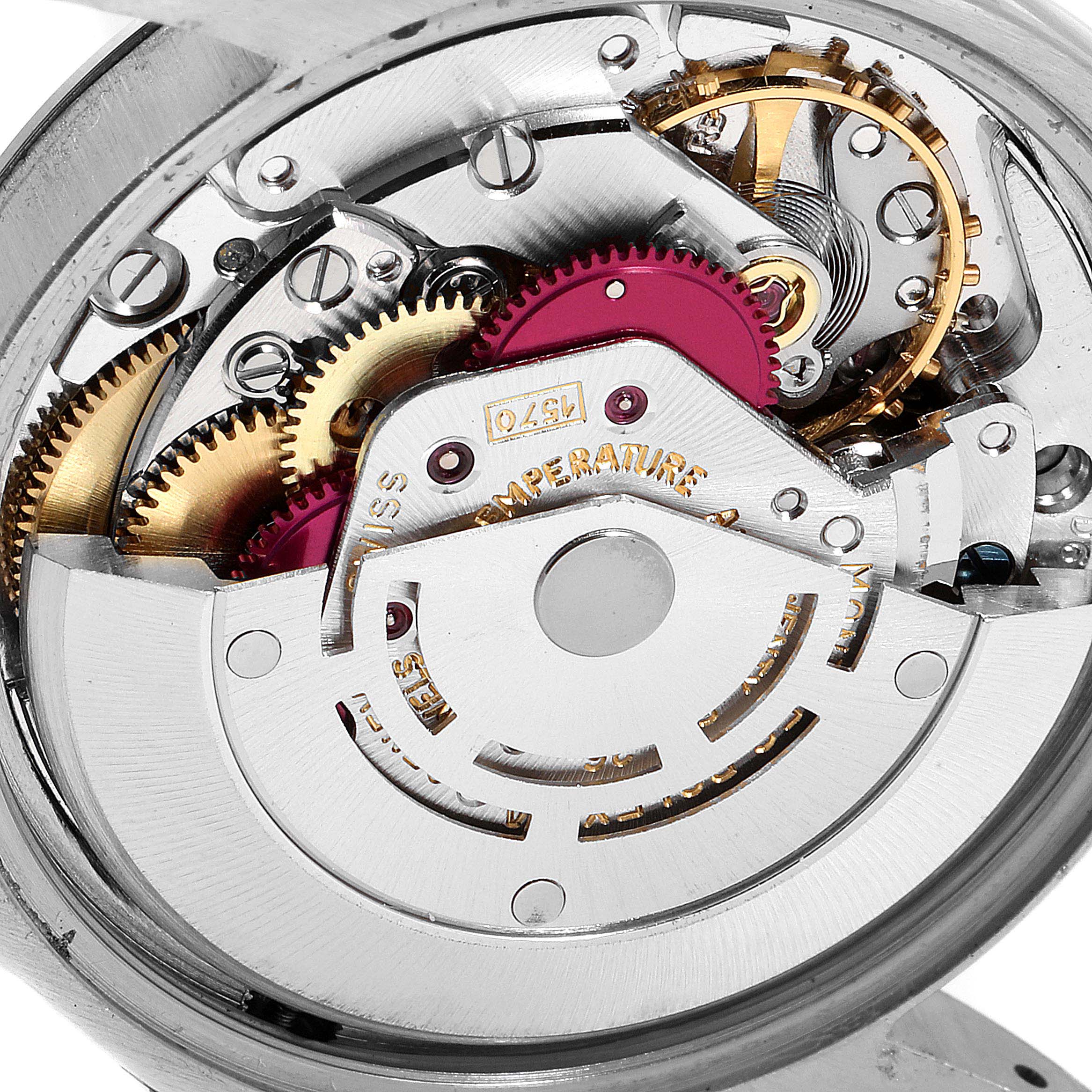 The image shows the internal mechanism of a Rolex Date 1500 Men's Stainless Steel Silver Dial 1500 Men's Stainless Steel Silver Dial model watch from a close-up angle.