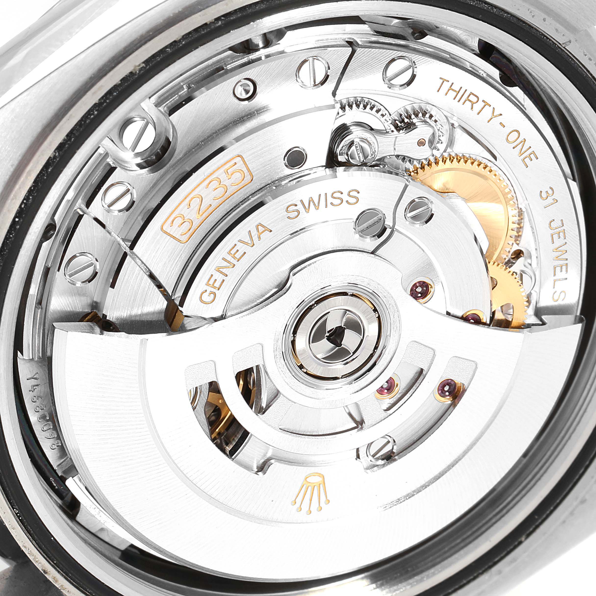 This image shows the internal mechanism and movement of the Rolex Datejust 41 126300 Men
s Stainless Steel Black Dial 126300 Men
s Stainless Steel Black Dial watch, focusing on the rotor and engraved parts.