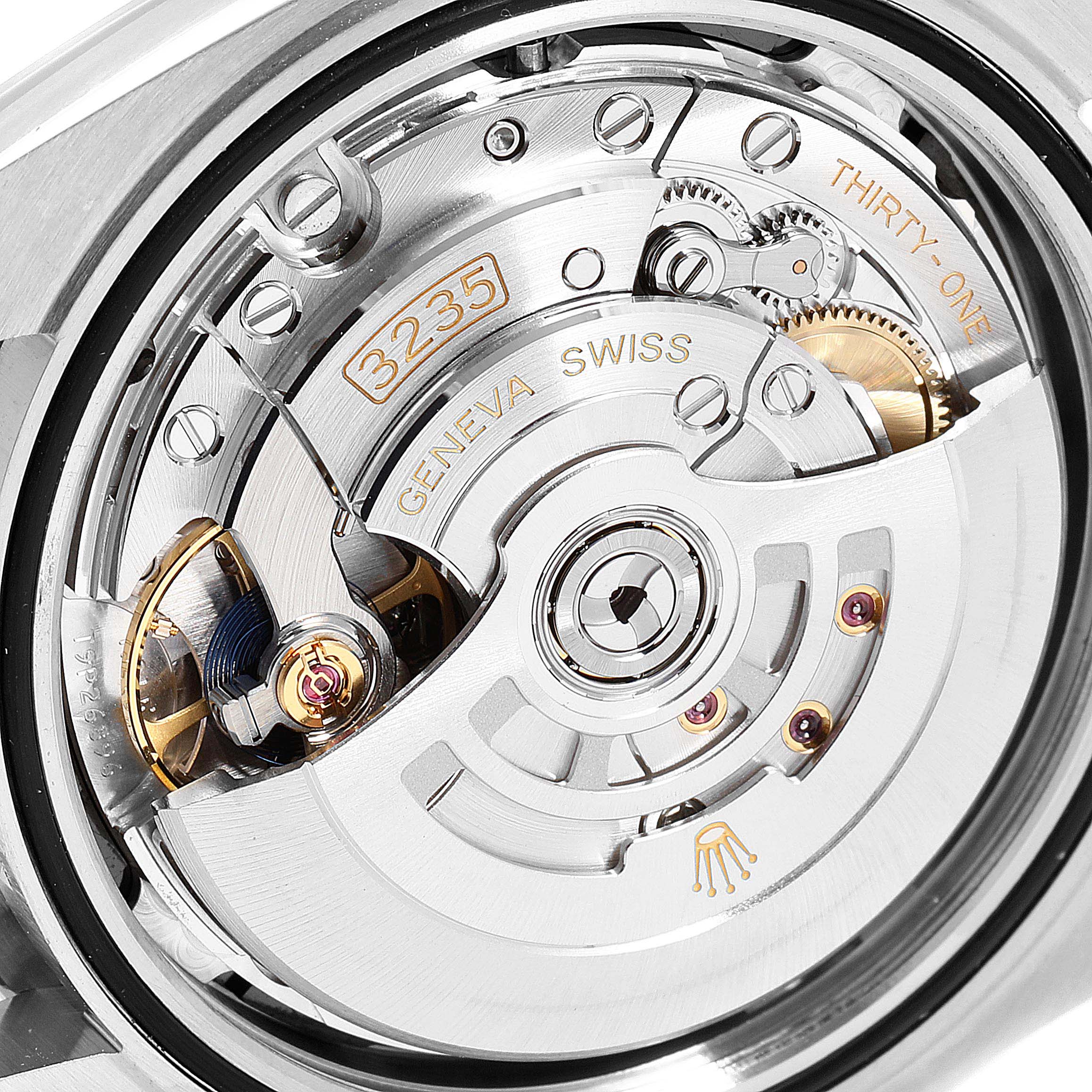 This image shows a close-up view of the Rolex Datejust 41 126300 Men
s Stainless Steel Black Dial 126300 Men
s Stainless Steel Black Dial watch movement, revealing its intricate mechanical parts.