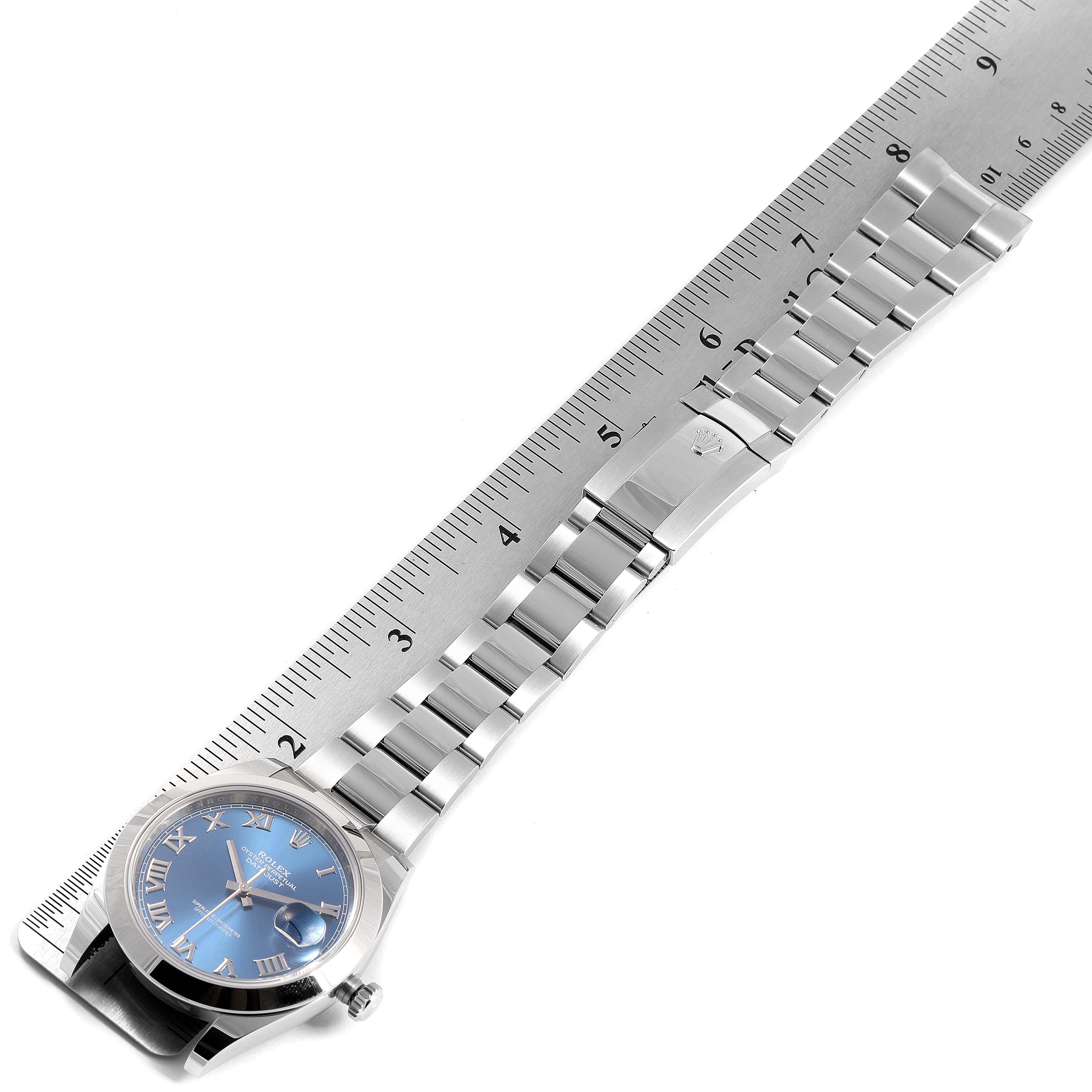 This image shows a Rolex Datejust 41 126300 Men
s Stainless Steel Blue Dial 126300 Men
s Stainless Steel Blue Dial watch, displaying the face, bracelet, and clasp from a top-down angle.