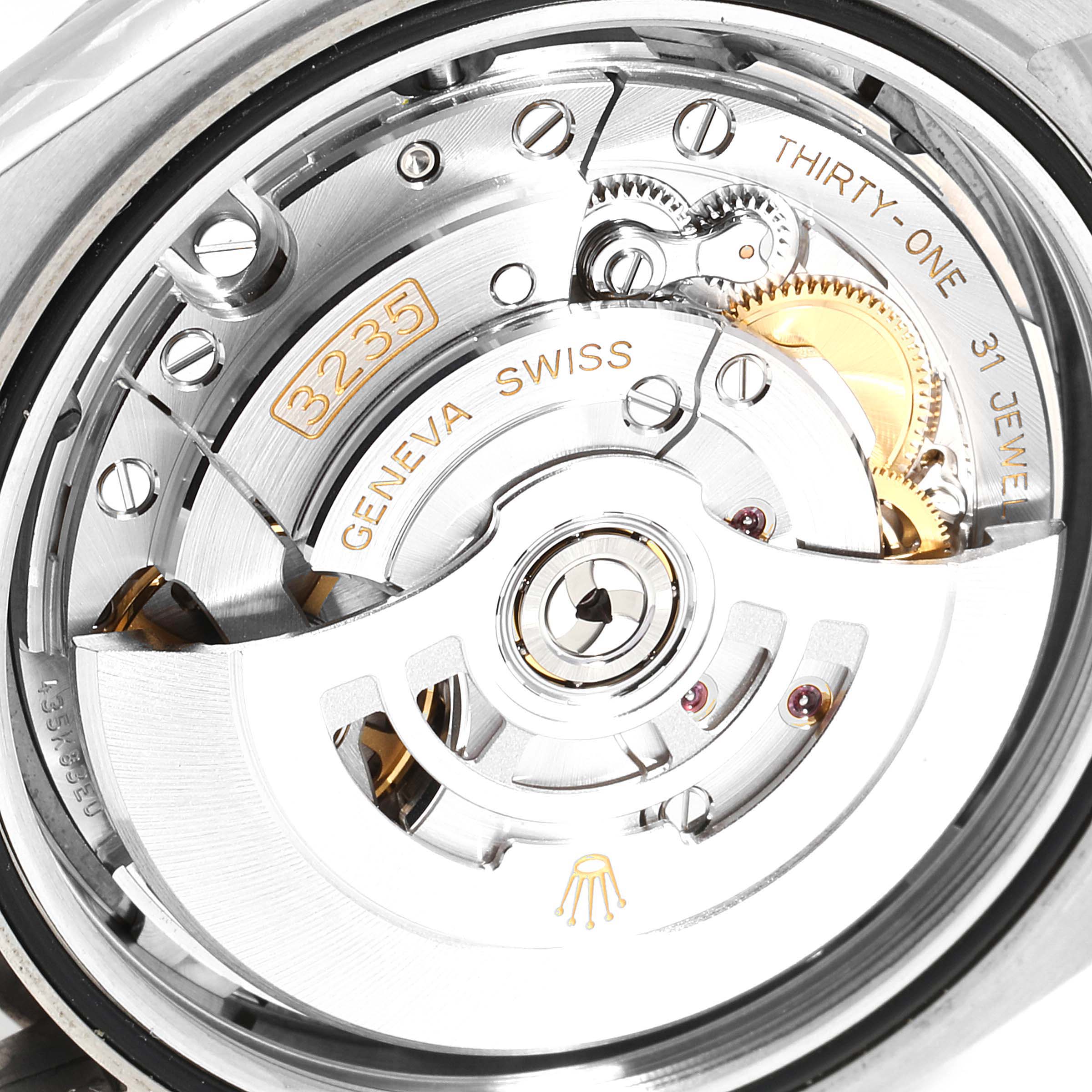 This image shows a close-up view of the movement mechanism and internal parts of the Rolex Datejust 41 126334 Men
s Stainless Steel Blue Dial 126334 Men
s Stainless Steel Blue Dial watch.