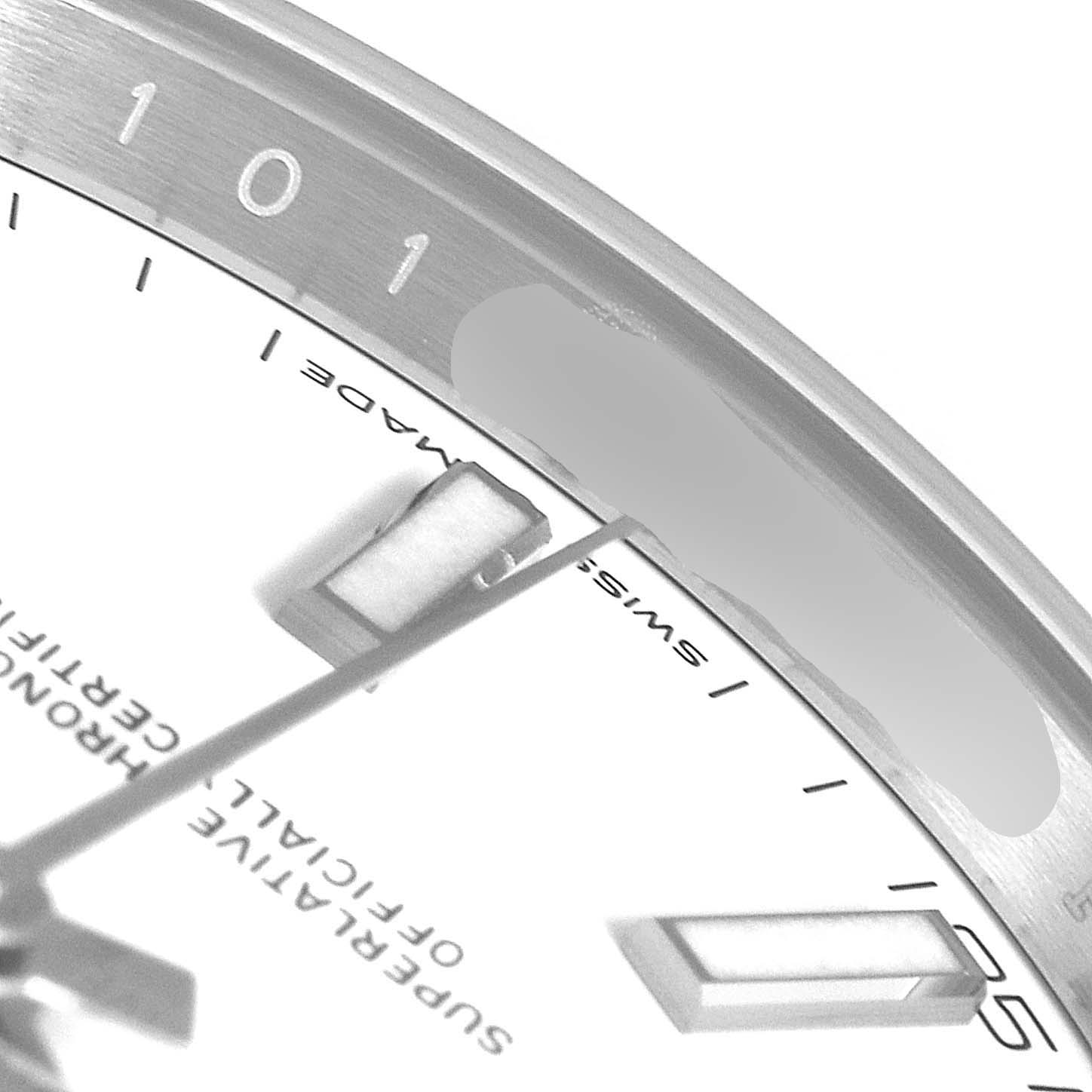 This close-up shot of the Rolex Datejust 41 126300 Men's Stainless Steel White Dial 126300 Men's Stainless Steel White Dial watch shows part of the dial and indices.