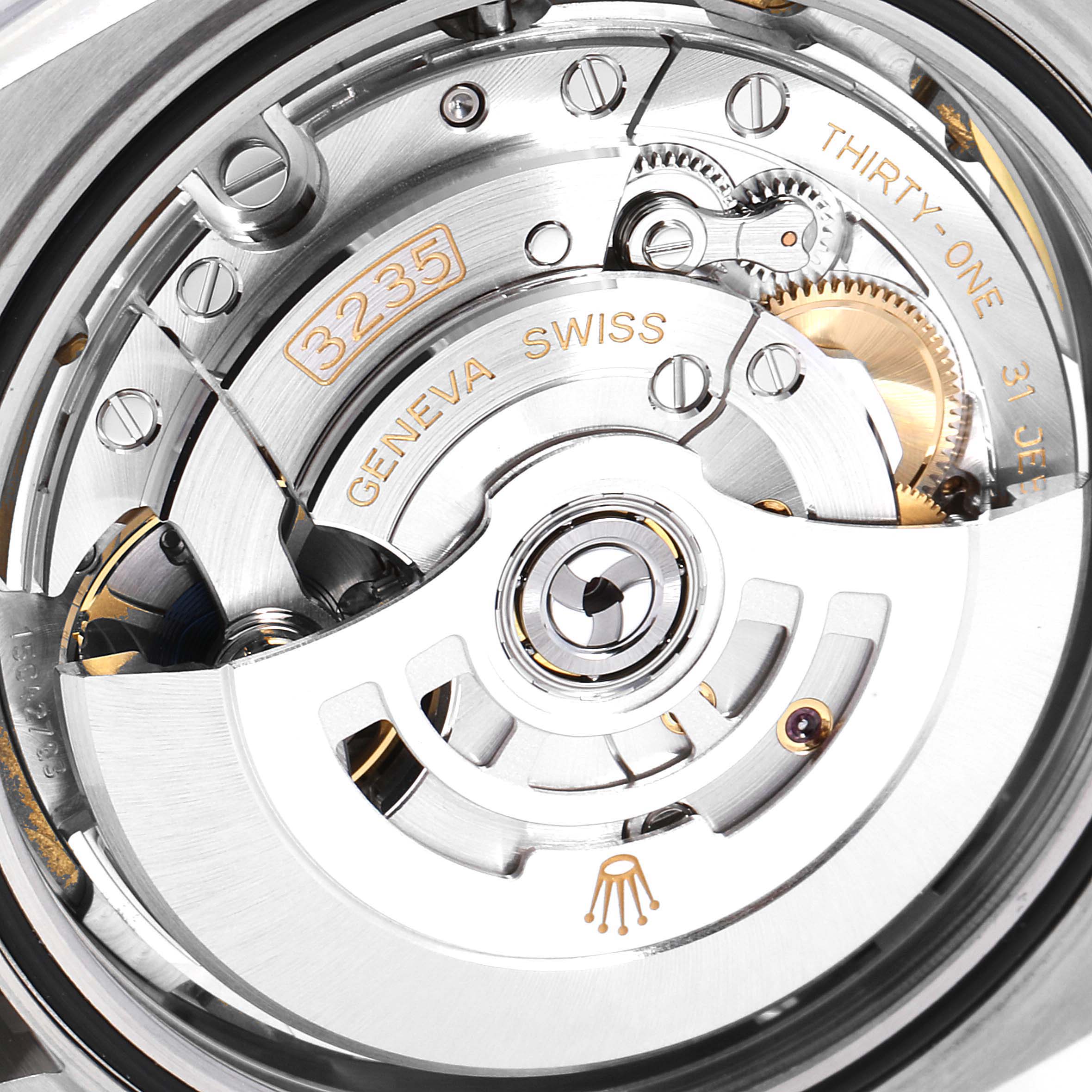 The image shows a close-up view of the movement mechanism inside a Rolex Datejust 41 126300 Men's Stainless Steel White Dial 126300 Men's Stainless Steel White Dial, highlighting the 3235 caliber.