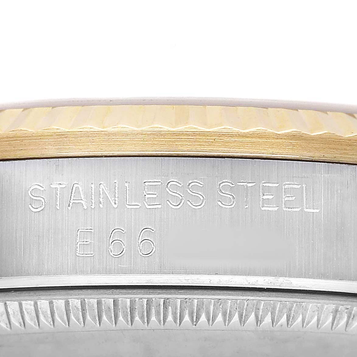 The image shows a side angle of the Rolex Mid-Size 68273 Women's Stainless Steel Champagne Dial model, highlighting the stainless steel case with engraved details.