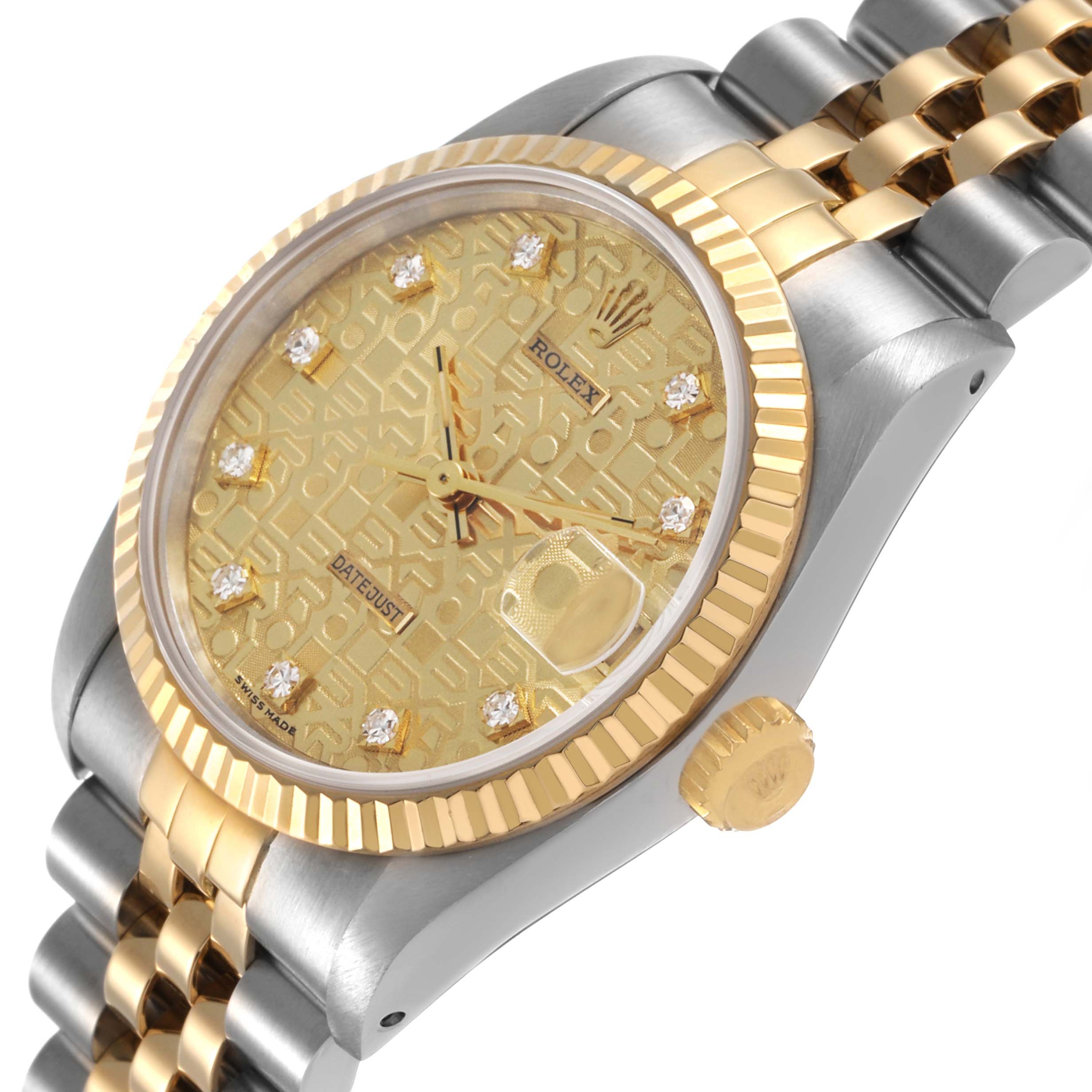 The image shows a Rolex Mid-Size 68273 Women's Stainless Steel Champagne Dial watch with a focus on the gold fluted bezel, dial, and part of the two-tone bracelet, viewed at an angle.