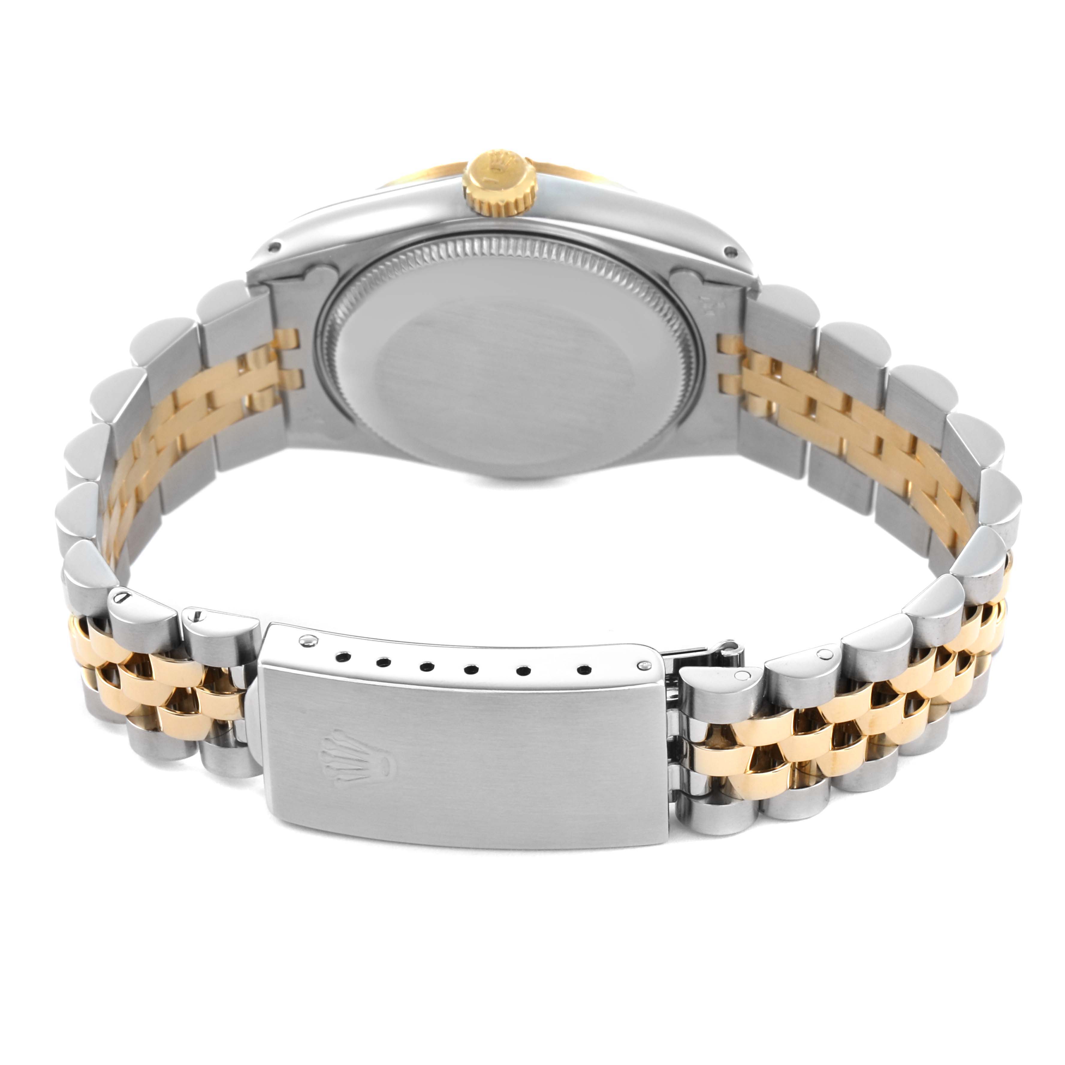 The image shows the back and bracelet of a Rolex Mid-Size 68273 Women's Stainless Steel Champagne Dial watch, highlighting the clasp and crown.