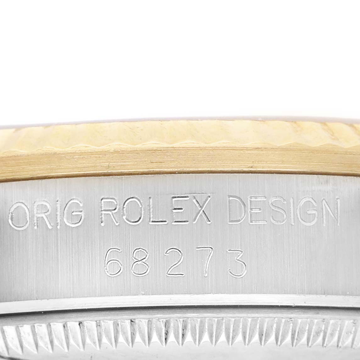 The image shows a close-up side view of the bezel and case of a Rolex Mid-Size 68273 Women's Stainless Steel Champagne Dial, highlighting the model number and "ORIG ROLEX DESIGN" engraving.