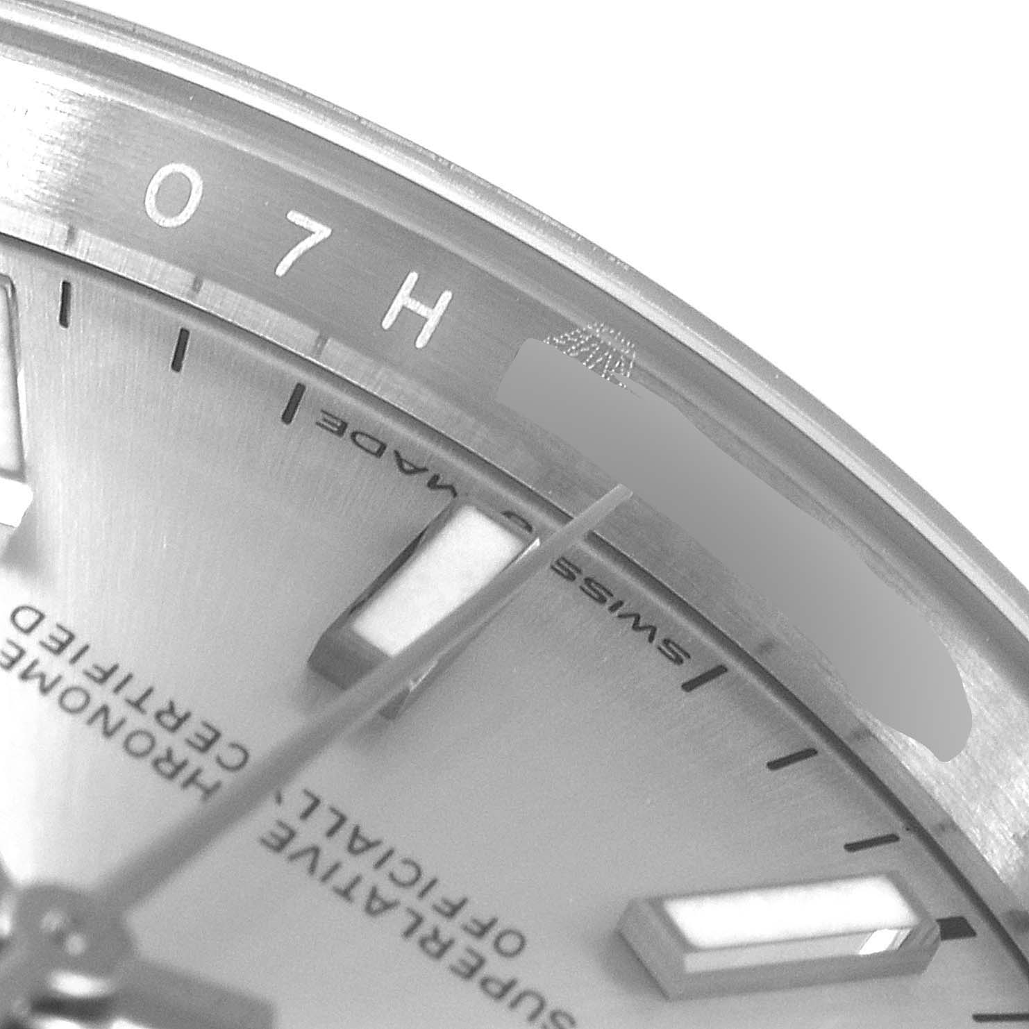 The image shows a close-up of the dial and bezel of a Rolex Datejust 126200 Men's Stainless Steel Silver Dial 126200 Men's Stainless Steel Silver Dial watch, highlighting the "Swiss Made" label and hour markers.