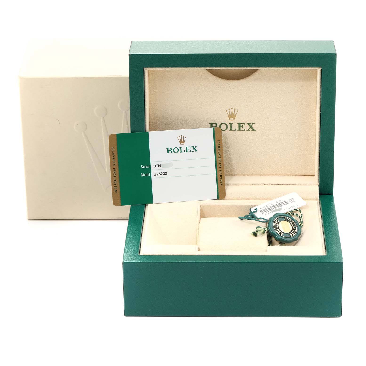 This image shows the packaging, warranty card, and tag of a Rolex Datejust 126200 Men's Stainless Steel Silver Dial 126200 Men's Stainless Steel Silver Dial model.