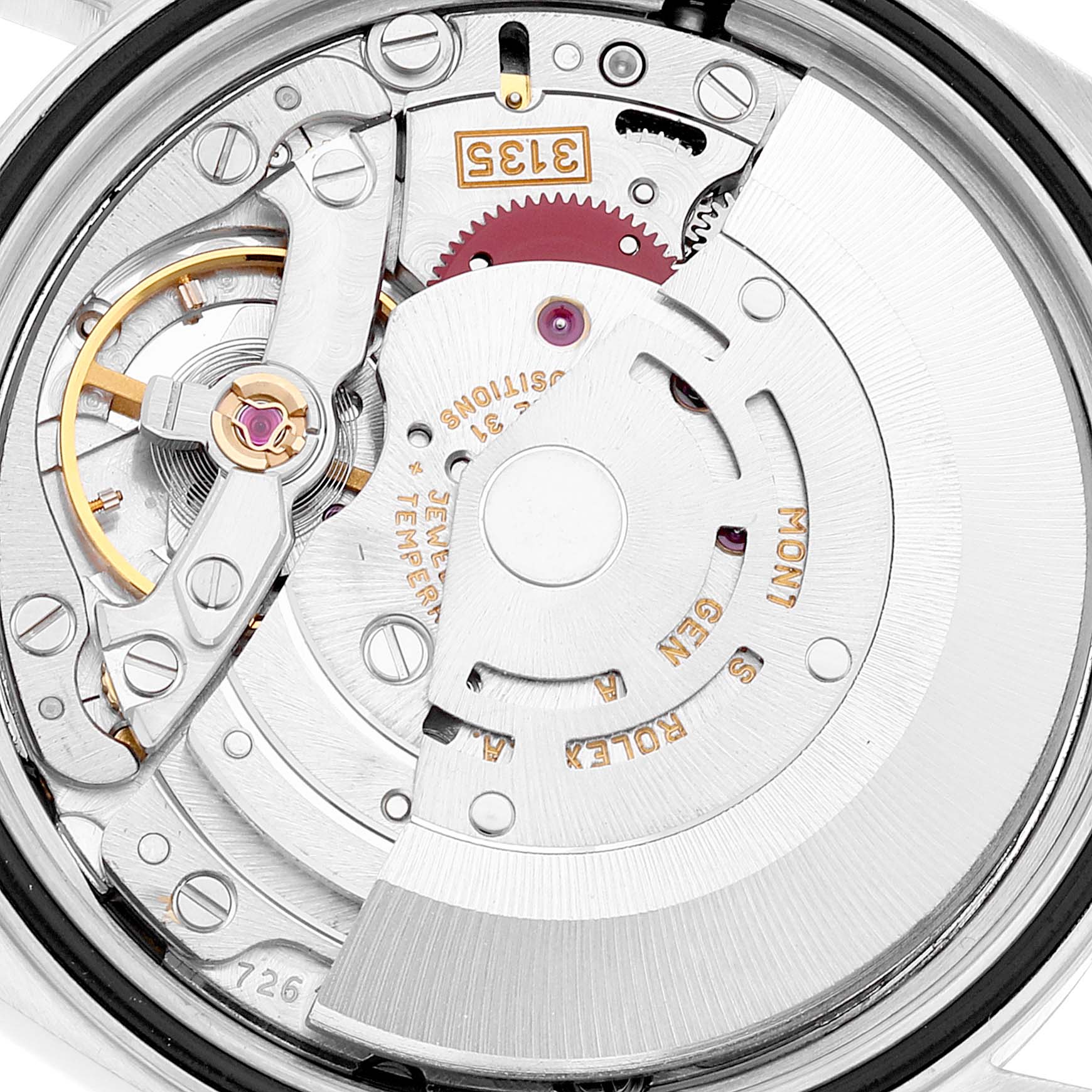 This image shows a detailed view of the movement mechanism of a Rolex Datejust 16233 Men's Steel and Gold (two tone) White Dial 16233 Men's Steel and Gold (two tone) White Dial watch from the back angle.